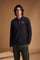 Men's long-sleeve polo in soft cotton jersey with contrasting gabardine collar, ribbed details, multicolor striped placket, and embroidered team logo for comfor - Black