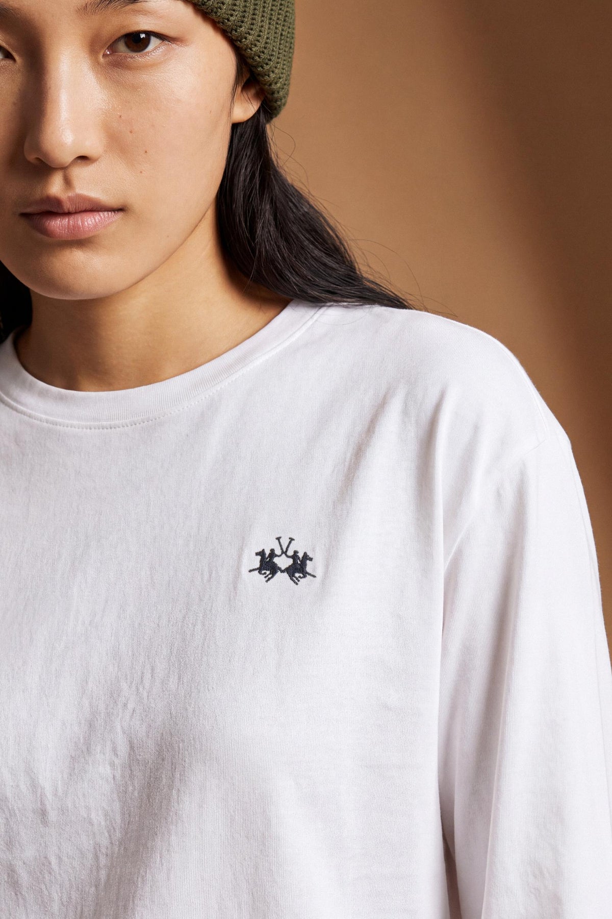 Soft cotton jersey long-sleeve T-shirt with a regular fit, crew neckline, and subtle embroidered logo. Smooth, comfortable, and slightly shaped for a clean look. - Optic White