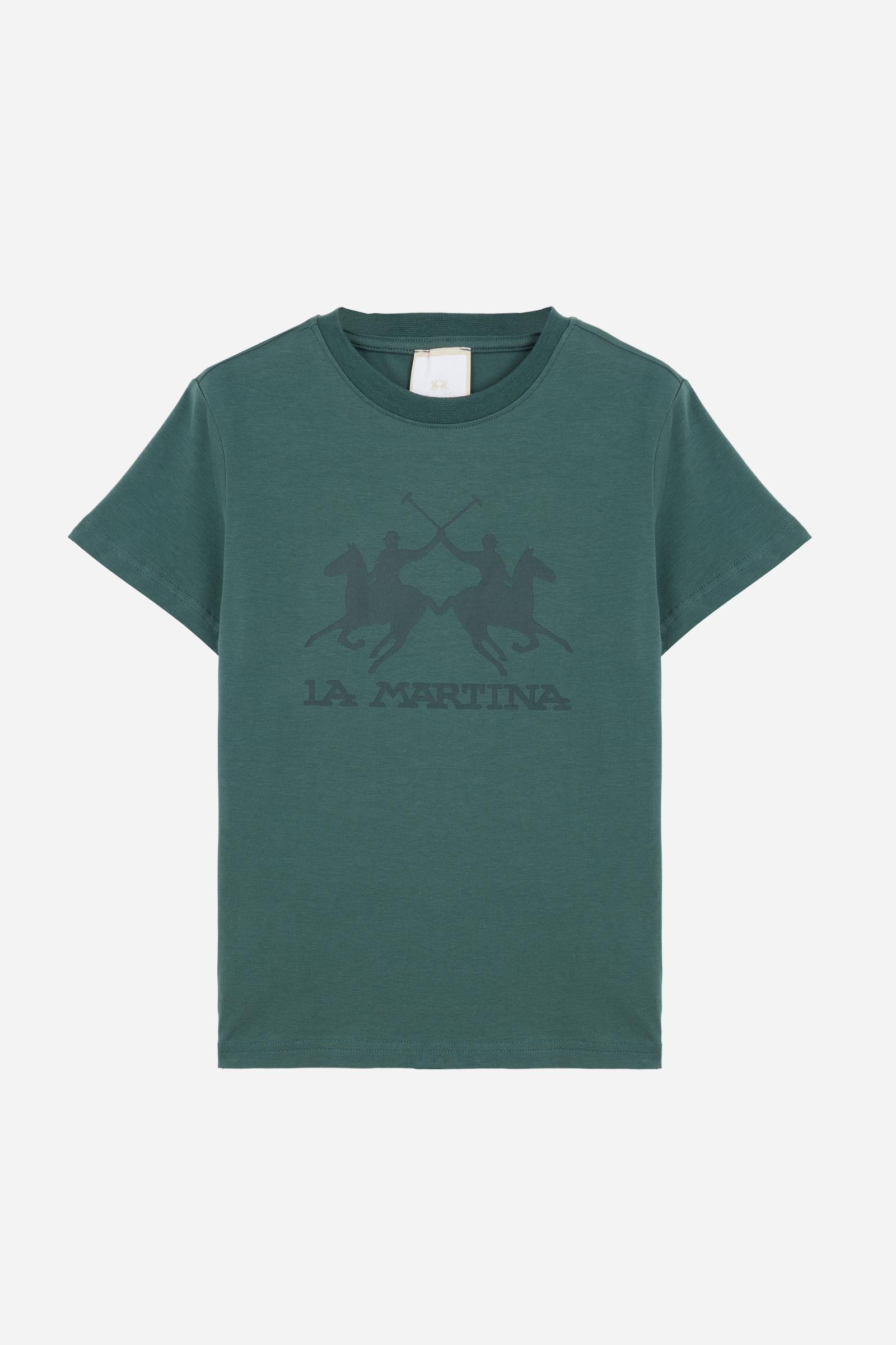 Short-sleeved T-shirt for girls made from soft 100% cotton jersey in a solid colour. The style features a regular fit and tonal ribbed crew neck. The maxi front print, featuring the iconic crossed polo players logo and La Martina lettering, enhances the garment with a sporty and recognisable style. - Pineneedle