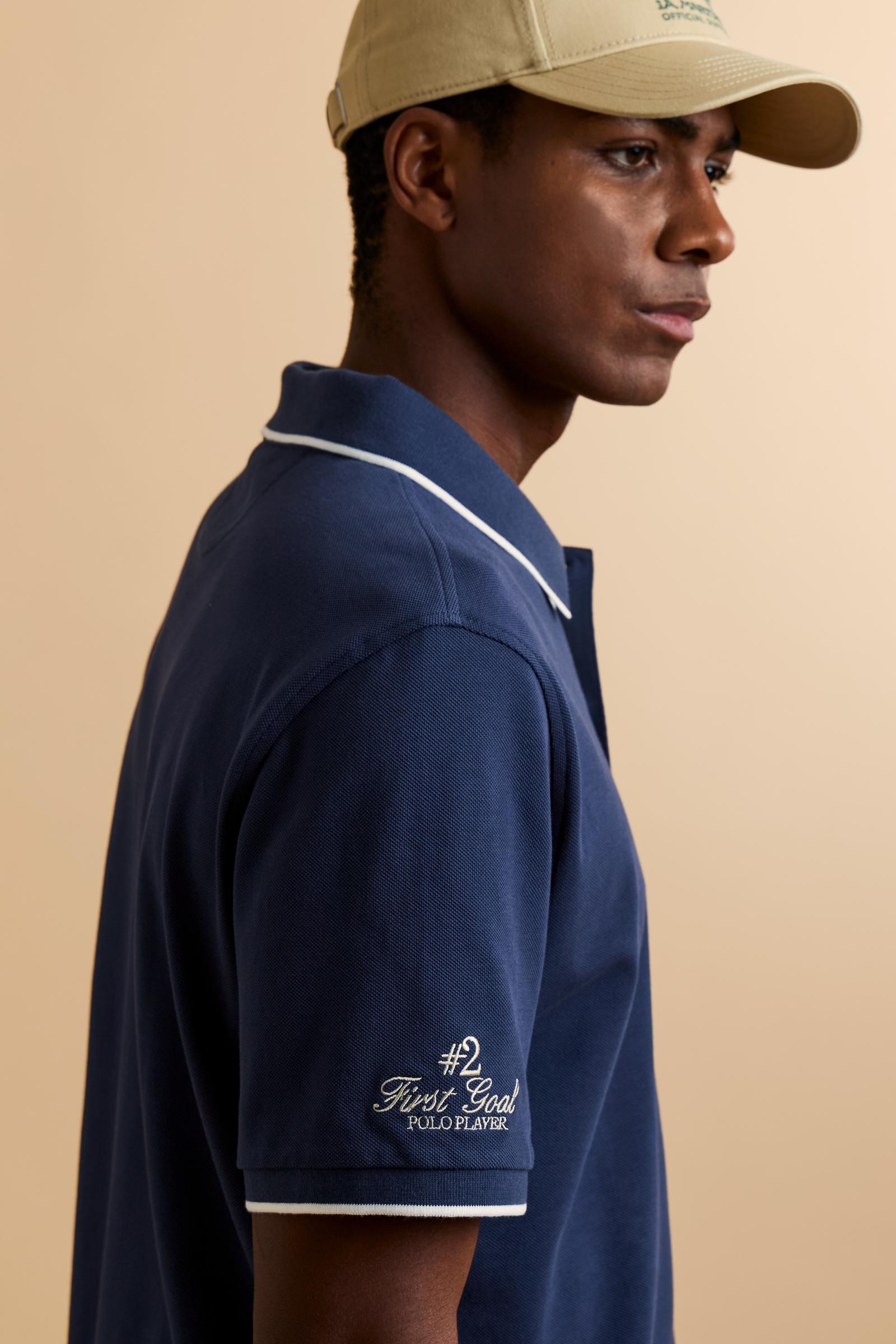 Piqué cotton polo with classic collar and contrast details. Graphic embroidery on chest and sleeves, including the “Academy Polo Club” crest. Modern clean fit. - Navy                                                                                                                                                                                                                                                                                                                                                          