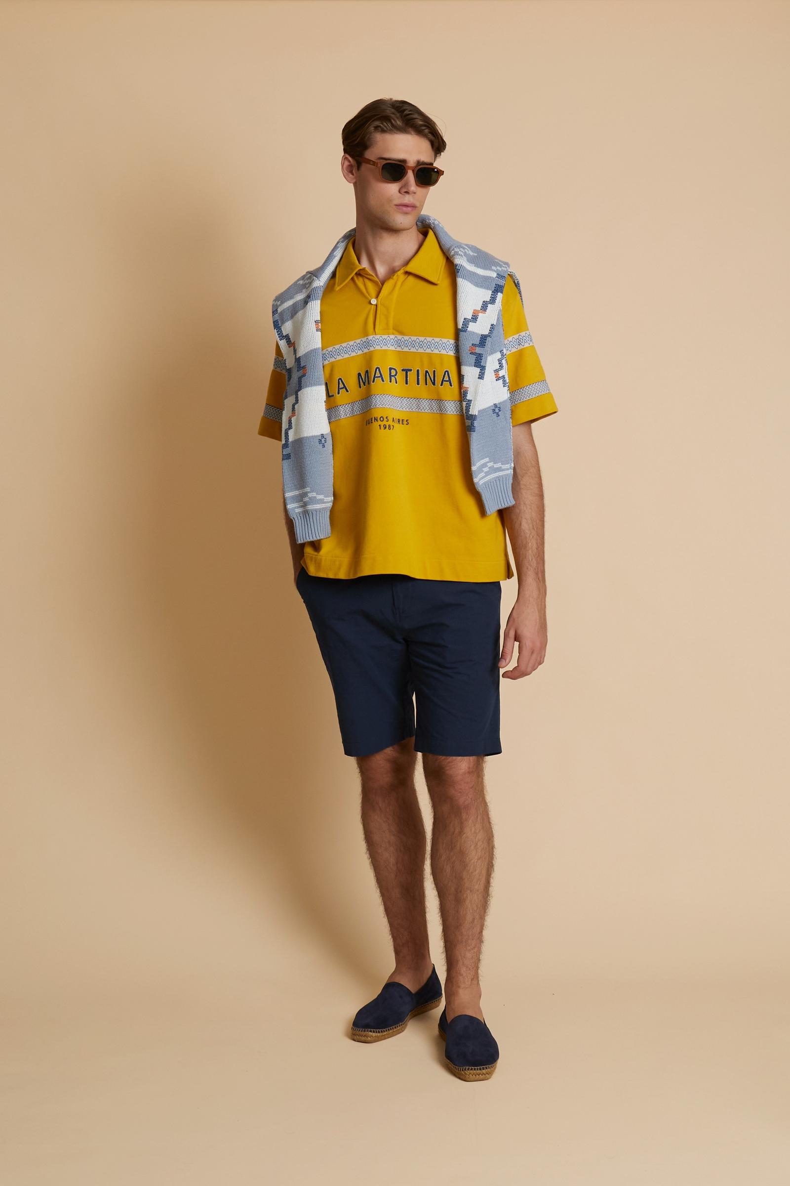 Short-sleeve polo in heavy cotton jersey with a compact structure and substantial hand feel. Contemporary fit with relaxed volume and slightly dropped shoulders. Classic collar with visible placket and bold horizontal band with geometric multicolor tapes. Raised “La Martina” embroidery on the chest and contrasting 3D logo on the back. - Tawny Olive                                                                                                                                                                  