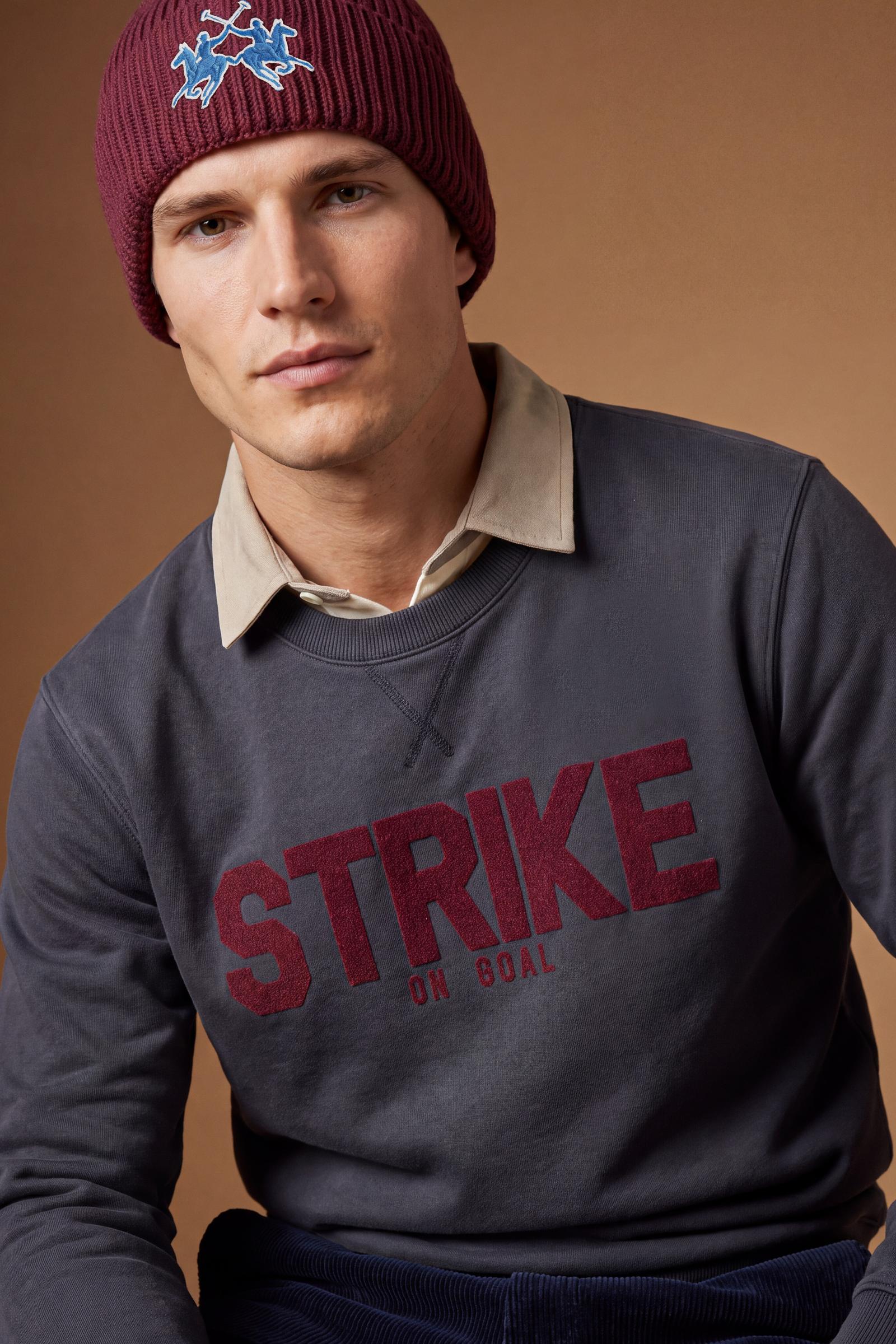 Men’s long-sleeve sweatshirt in soft 100% cotton with ribbed collar, cuffs, and hem. Relaxed fit with dropped shoulders and bold polo-inspired front print. - Navy Blazer