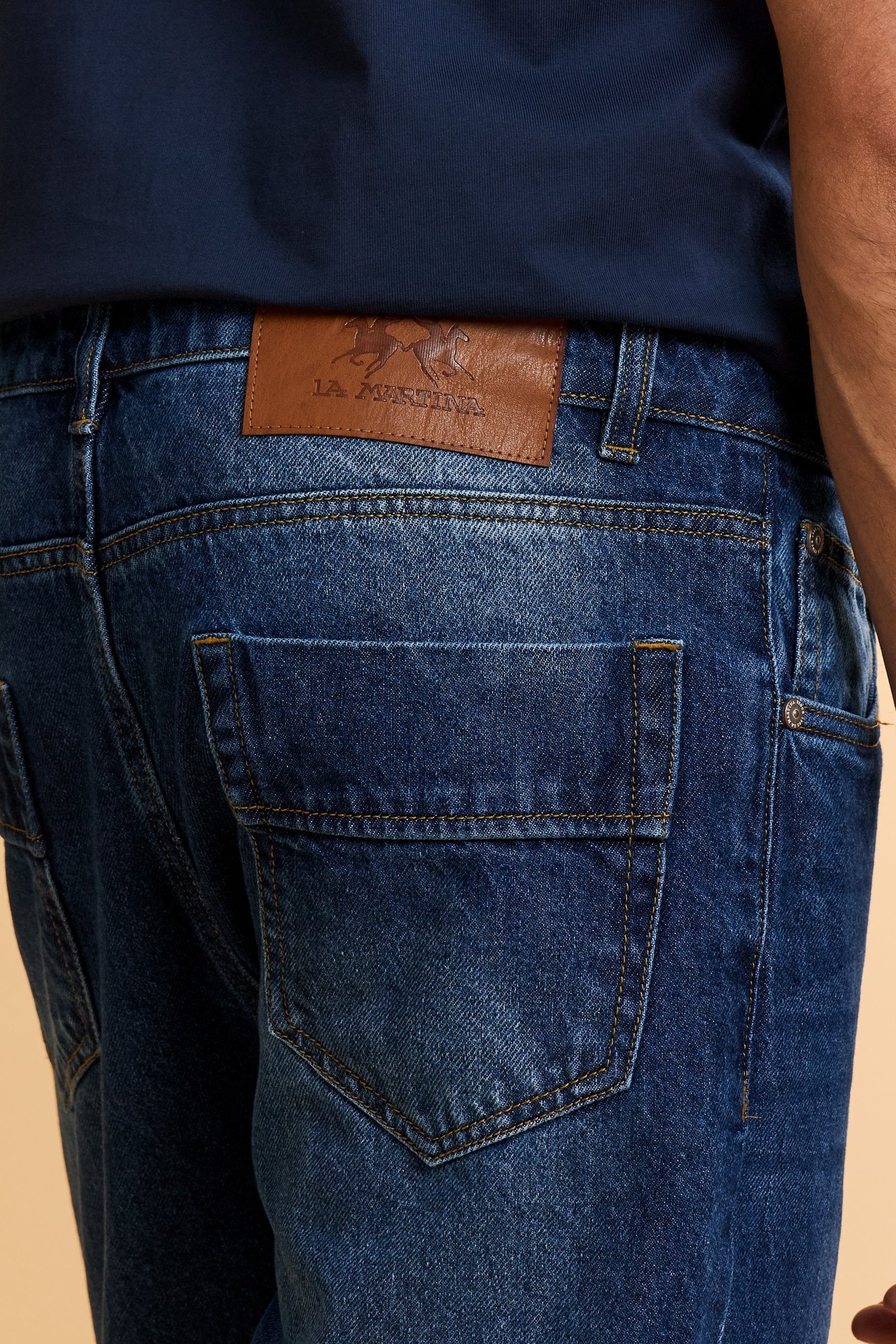 Five-pocket jeans in stretch cotton denim with branded rivets and button. Regular waist and slim leg. Embroidered logo on coin pocket and branded label on the back. - Dark Indigo Denim                                                                                                                                                                                                                                                                                                                                        