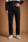Men's stretch cotton twill trousers with a regular fit, straight leg, American-style side pockets, flap back pockets, and a waistband with zip, button, and belt loops. - Black