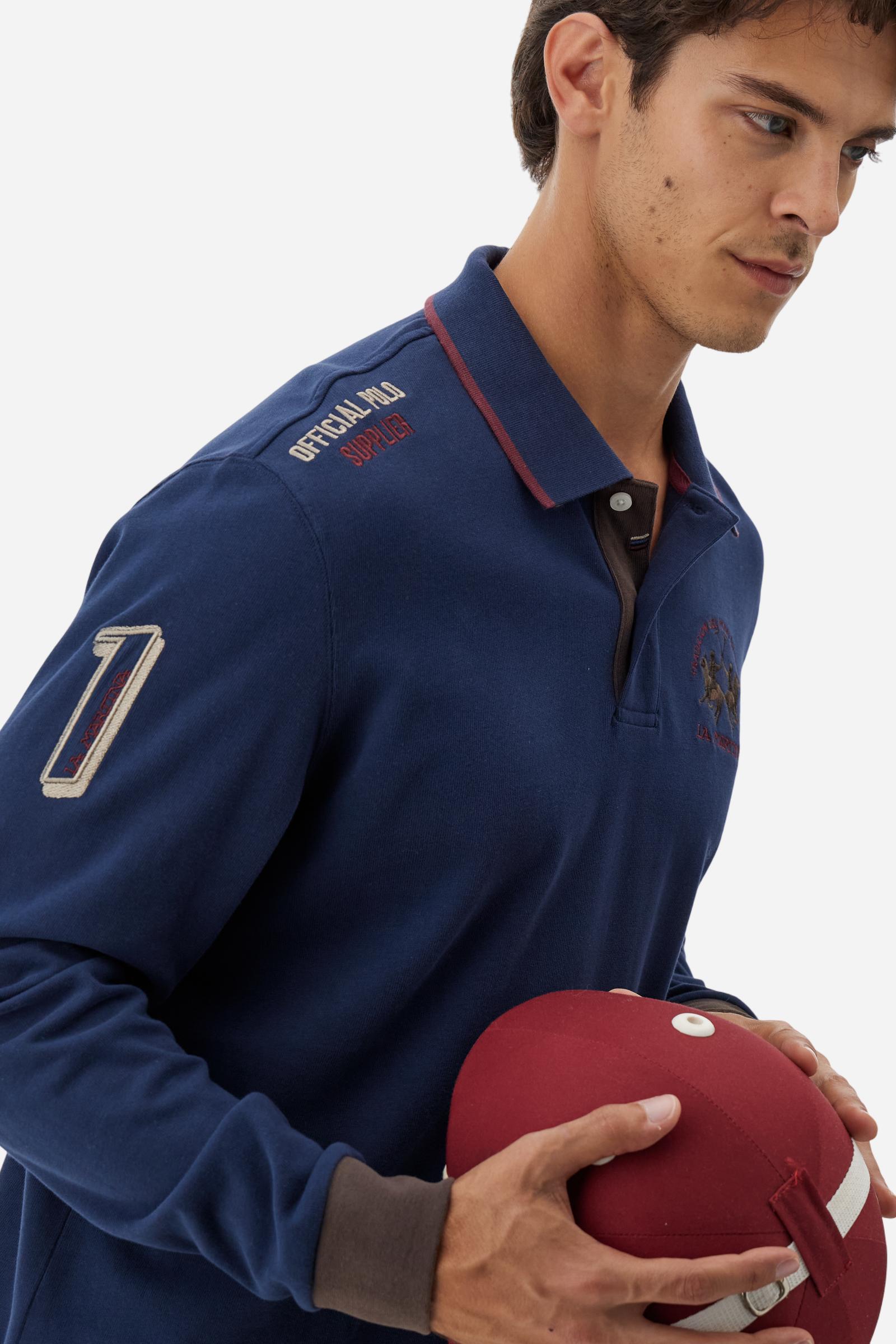 Men’s long-sleeve polo shirt in solid-colour cotton jersey with a warm, matte handfeel. Ribbed collar and cuffs with stripes and colour blocks in contrast, two personalised buttons and contrast details inside the collar. Patches and graphics on sleeves and chest celebrate the Official Polo Supplier team. The large multicolour logo is embroidered on the chest. Regular fit. The model wears size L. - Navy
