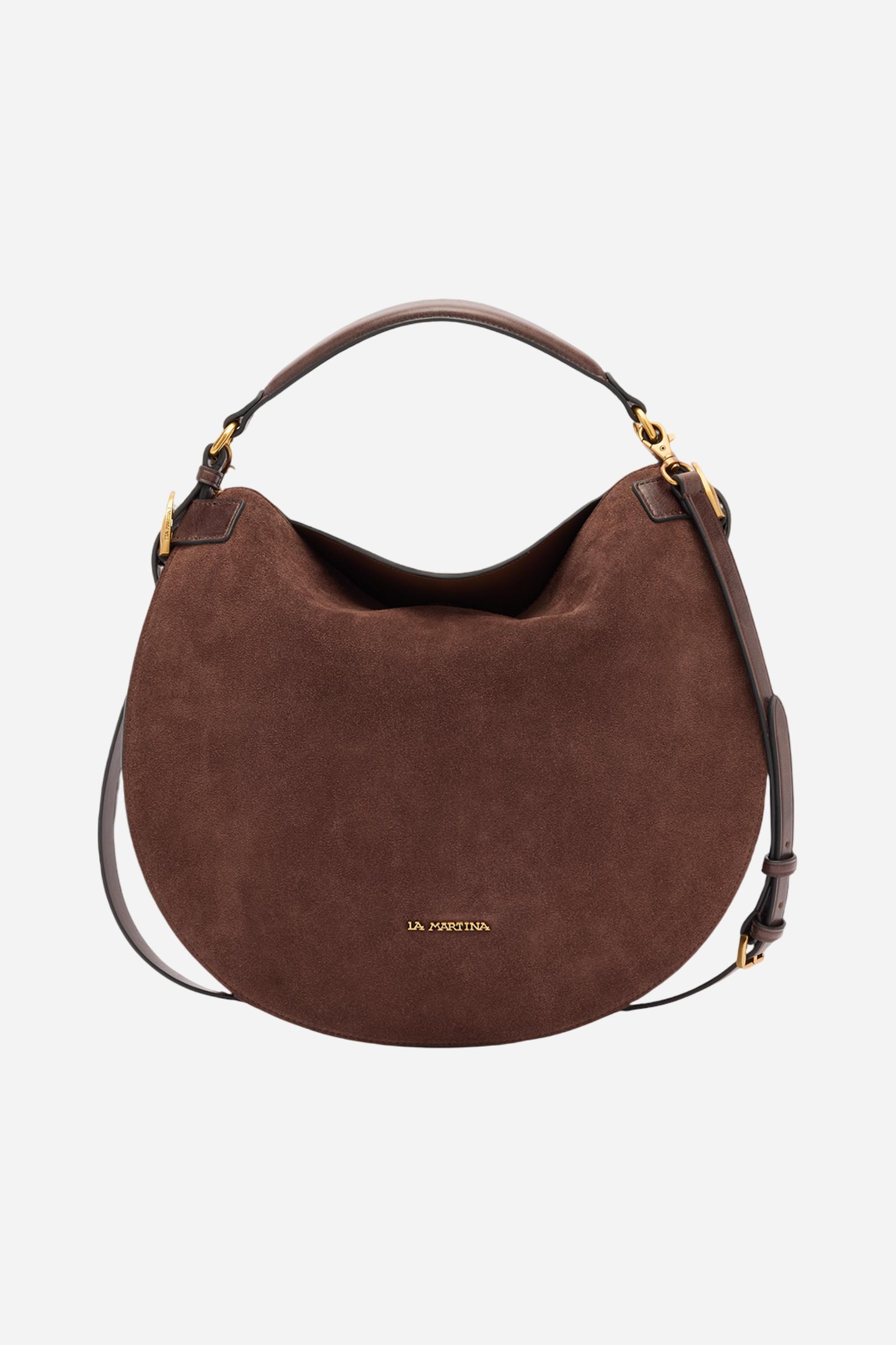 Large hobo bag crafted from solid-colour suede. Contrasting leather inserts on the sides recall traditional craftsmanship. Structured handle and detachable leather shoulder strap, both in a contrasting hue. Gold-tone engraved logo plaque on the lower front. Dimensions:25 x 28 x 6 - D.BROWN/D.CHOCOLATE