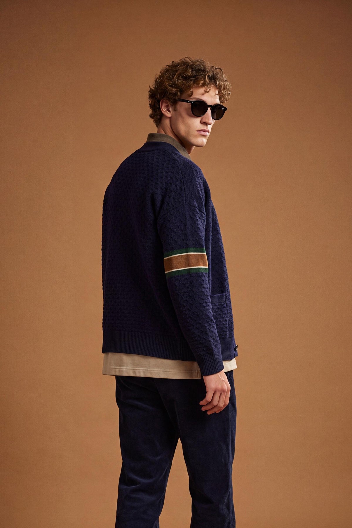 Men's long-sleeve cardigan in 50% lambswool blend with 3D knit, large buttons, patch pockets, bold "3" applique, brand embroidery, and relaxed oversized fit. - Navy