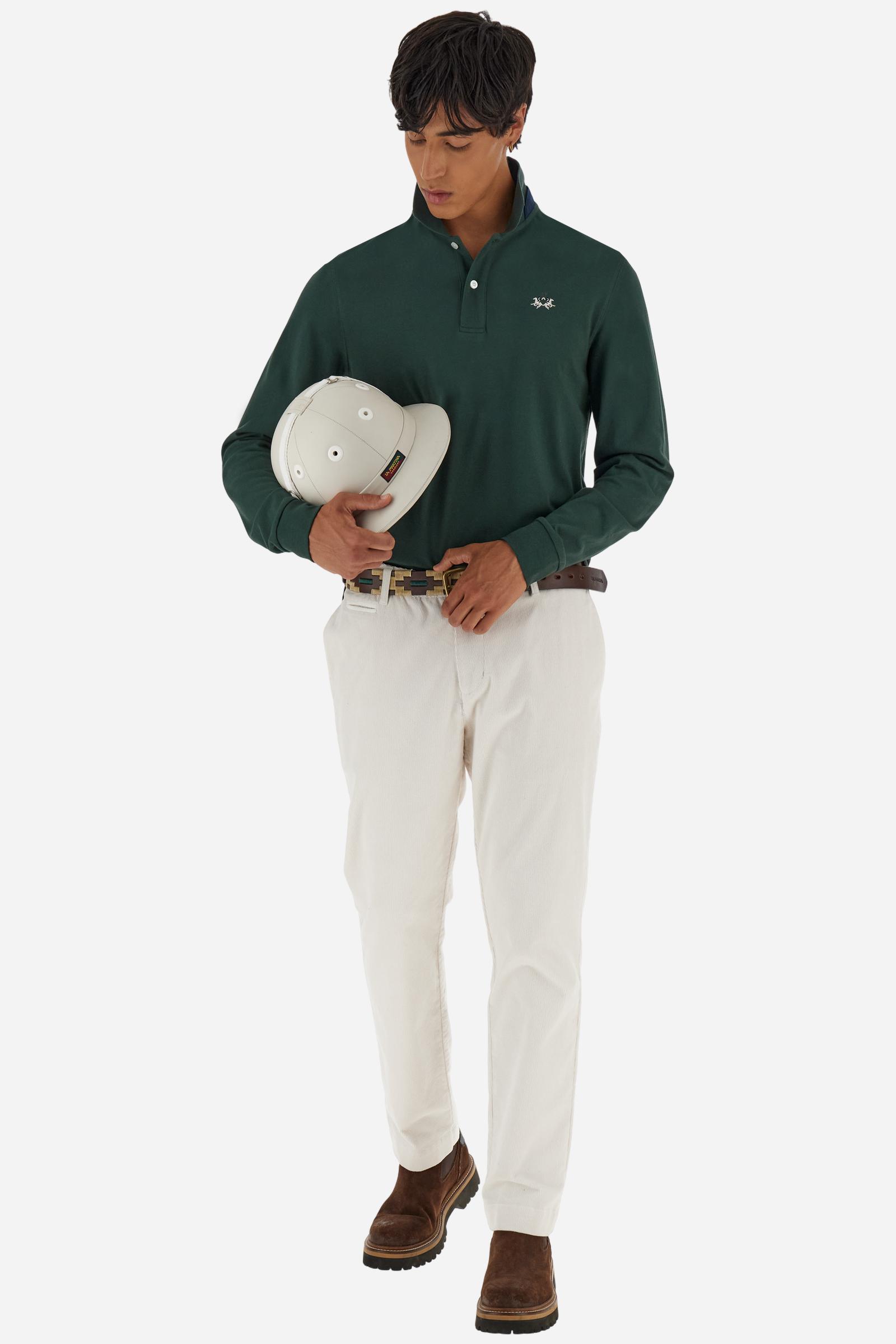 Men’s long-sleeve polo in high-quality stretch cotton piqué for comfort and flexibility. Tone-on-tone ribbed collar with contrast gabardine undercollar embroidered with the brand’s iconic lettering, revealed when the collar is lifted. Contrast embroidered logo on the chest. Slim fit, offering a modern silhouette that enhances the body while ensuring freedom of movement. Model wears size L. - Sycamore