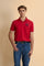 Men's short-sleeve polo shirt made from solid-color stretch piqué fabric. The model features a two-button front placket with ribbed collar and cuffs in matching tone. An iconic design of the brand, it stands out for the large embroidered team logo in contrasting color on the chest and the bold brand print under the collar in contrasting color. The regular fit ensures comfort and versatility for everyday wear. The model is wearing size L. - Formula One                                                         