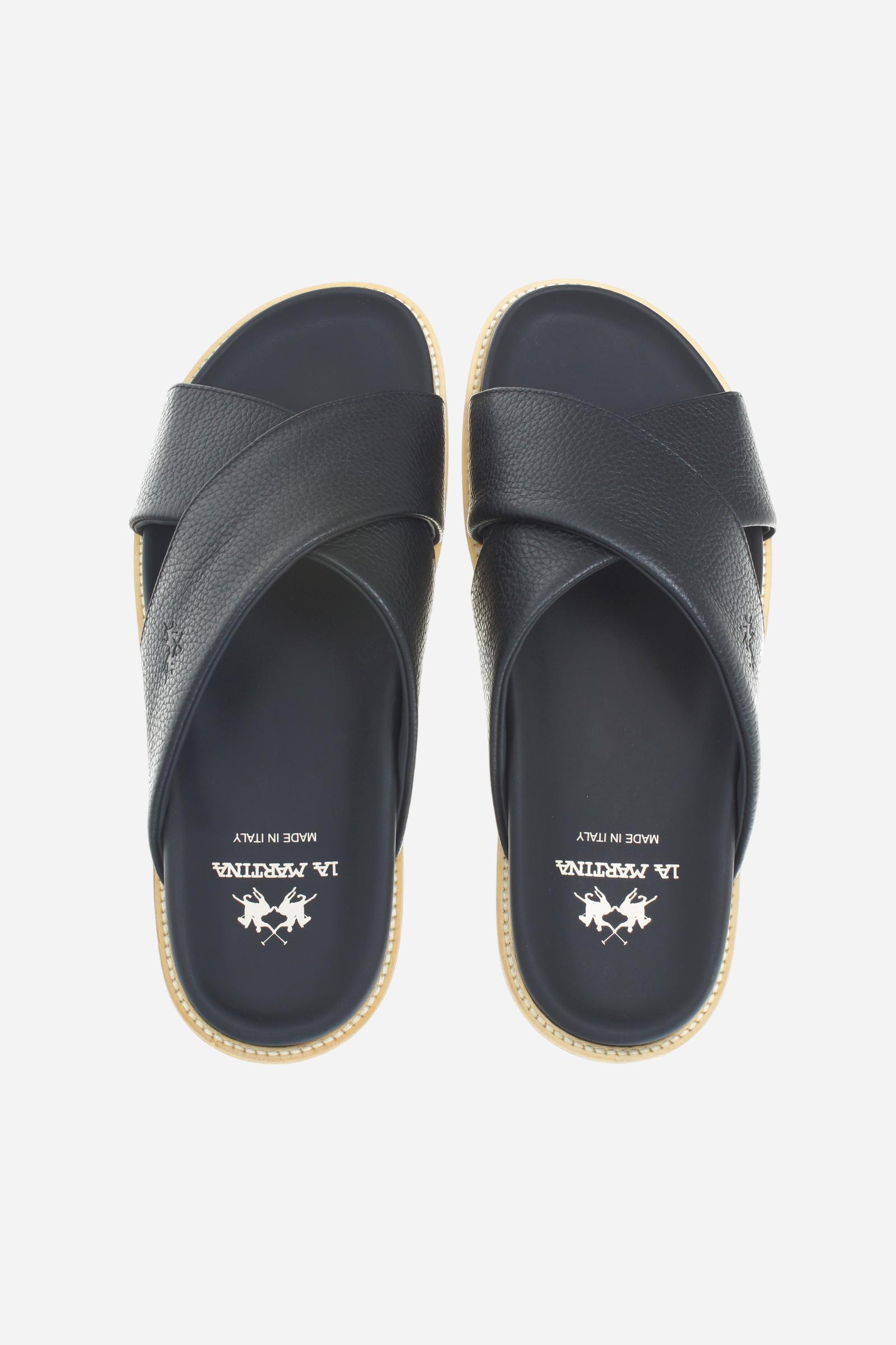 Men’s slides, lightweight and comfortable, made from super soft nappa leather with inner lining on the straps for enhanced comfort. The leather welt, stitched directly to the upper, adds a handcrafted detail that elevates the design. The model features a printed logo on the covered footbed and horse motif on the side strap. The ultra-light EVA sole ensures practicality, lightness, and freedom of movement for everyday wear combining comfort and style. - Black                                                  