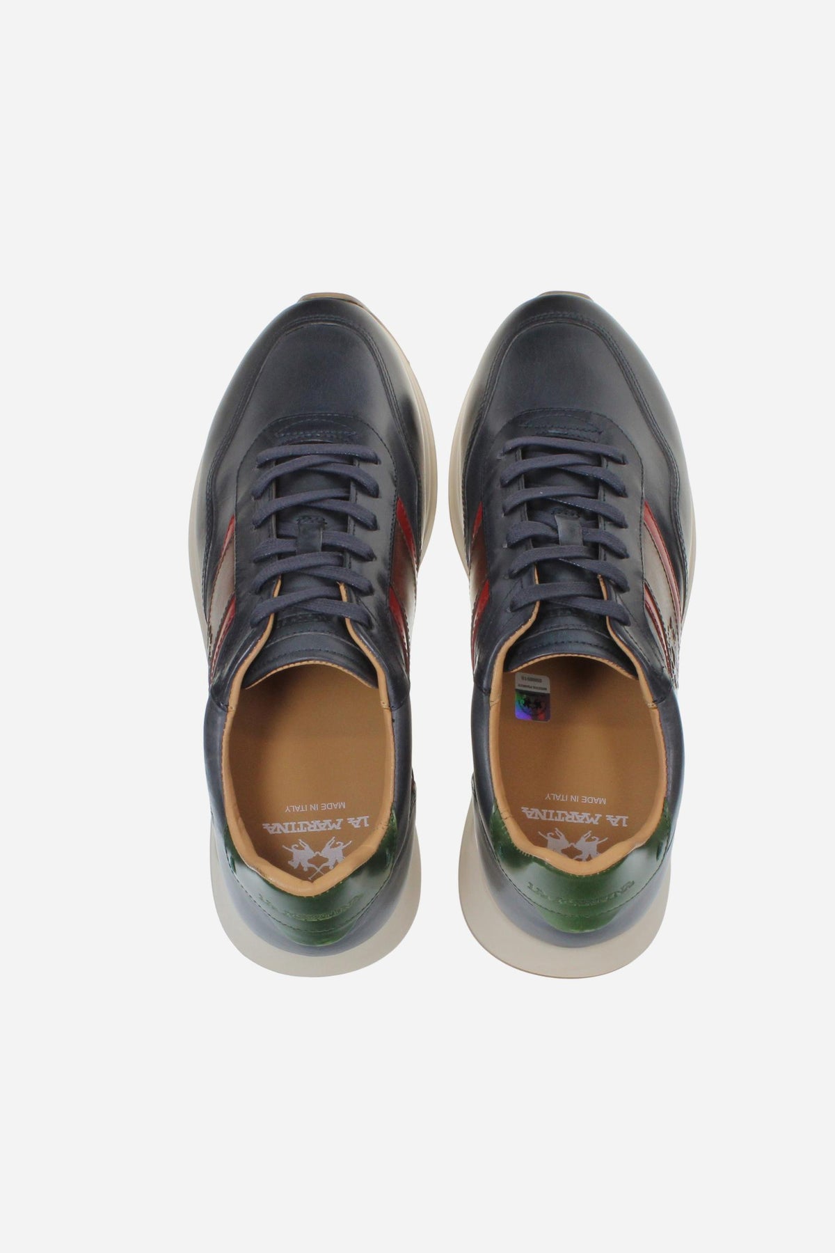 Men's sneaker combining calf and vegetable-tanned leather with artisanal stitching, branded logo, and high-cushioning rubber PU sole for lasting comfort and style. - Salute