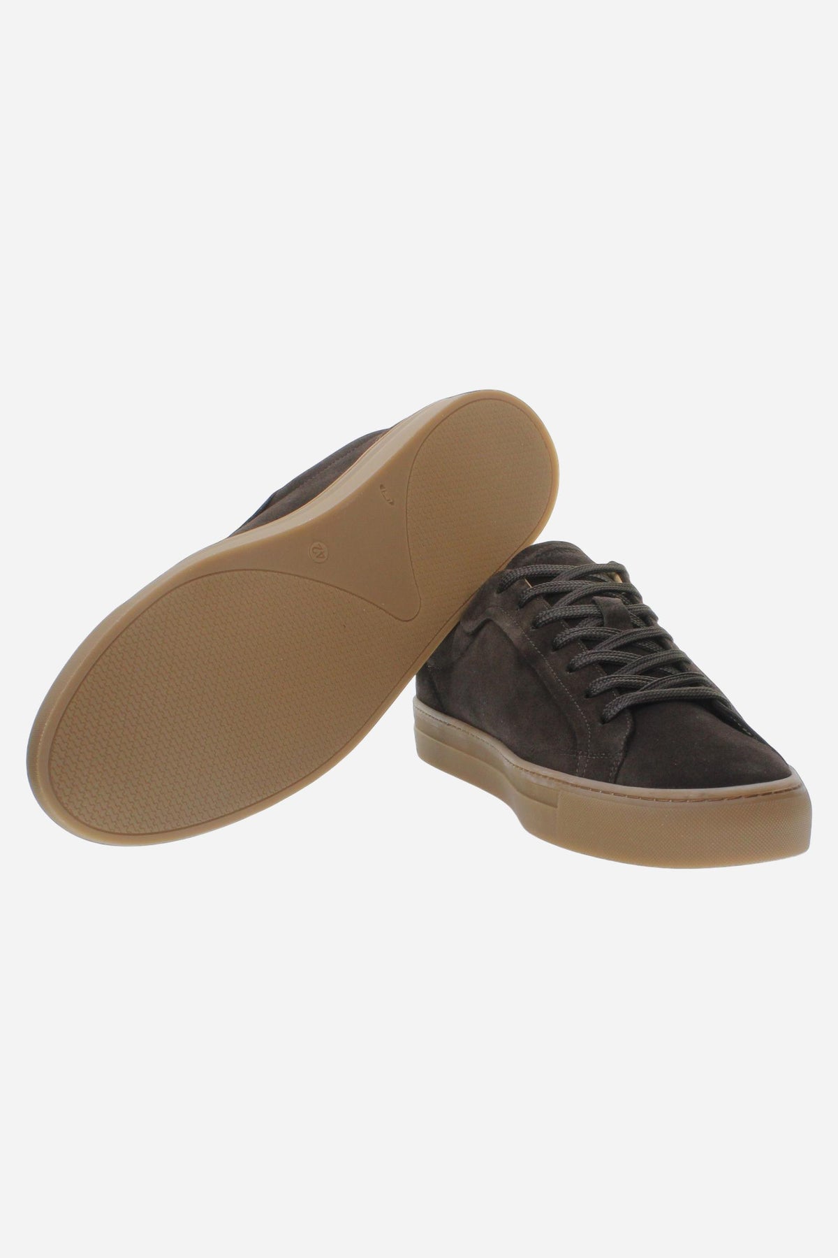 Men’s suede sneaker with flexible two-part leather tongue, hand-stitched embossed logo, amber rubber sole, and lightweight Strobel construction for all-day comfort. - Dark Brown