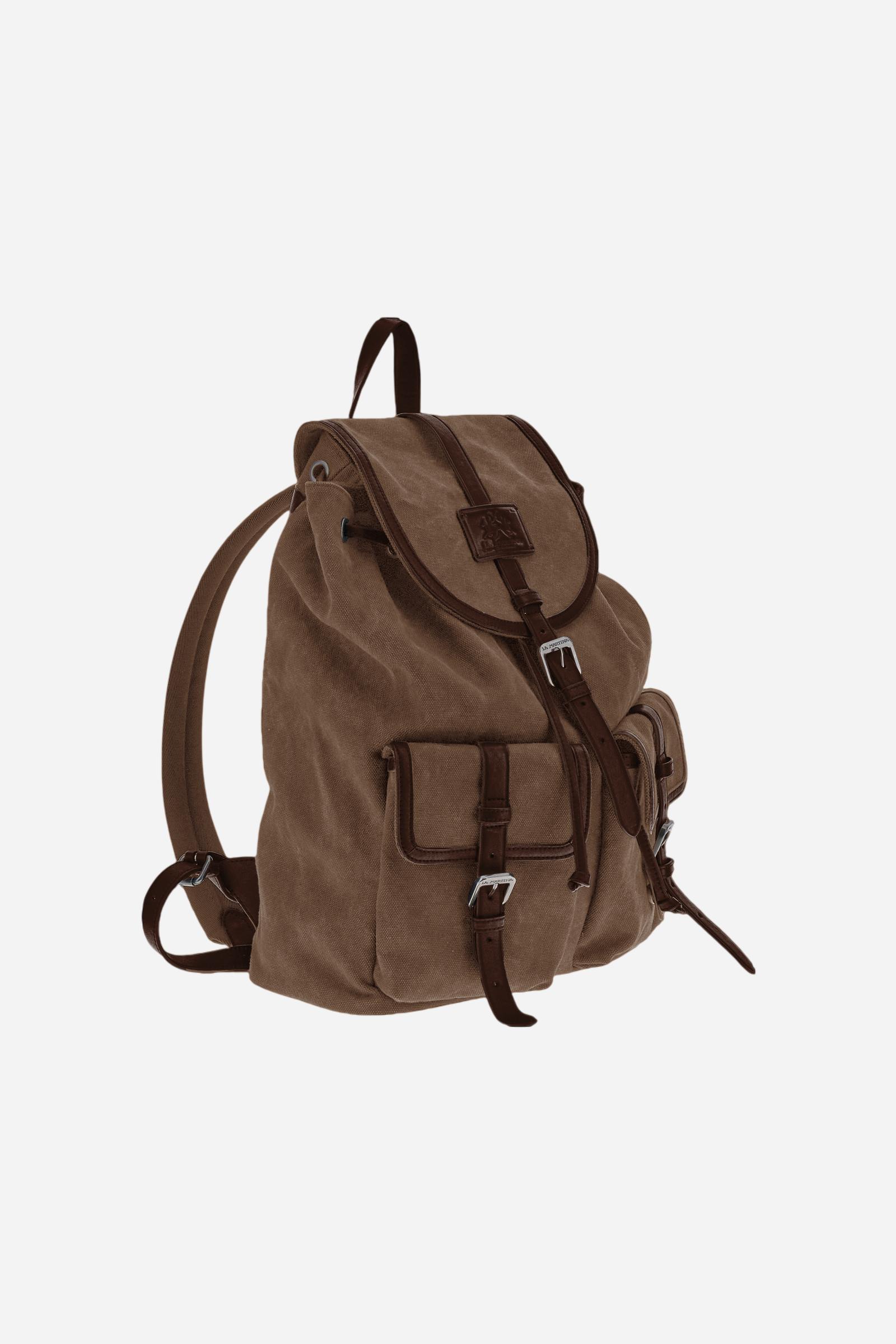 Backpack in washed canvas and leather. Versatile and roomy, with double closure, large front pockets and embossed leather tag. - COCOA