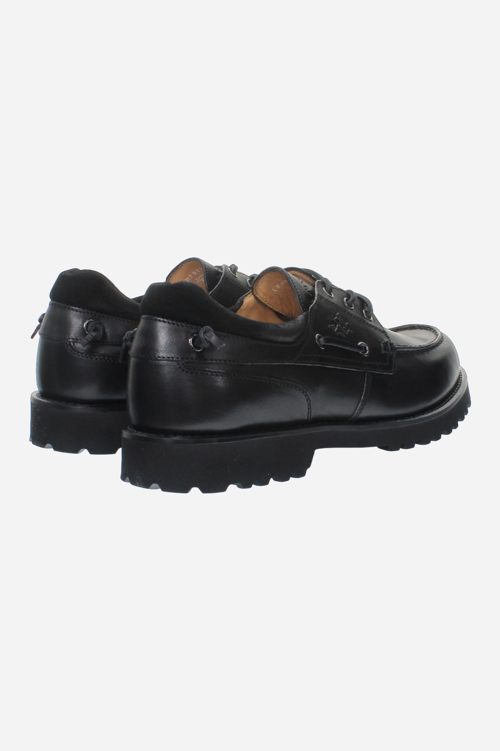 Men's leather boat shoe with handcrafted moccasin stitching, padded nappa collar, leather laces, and Vibram® sole for lightweight comfort, cushioning, and grip. - Black