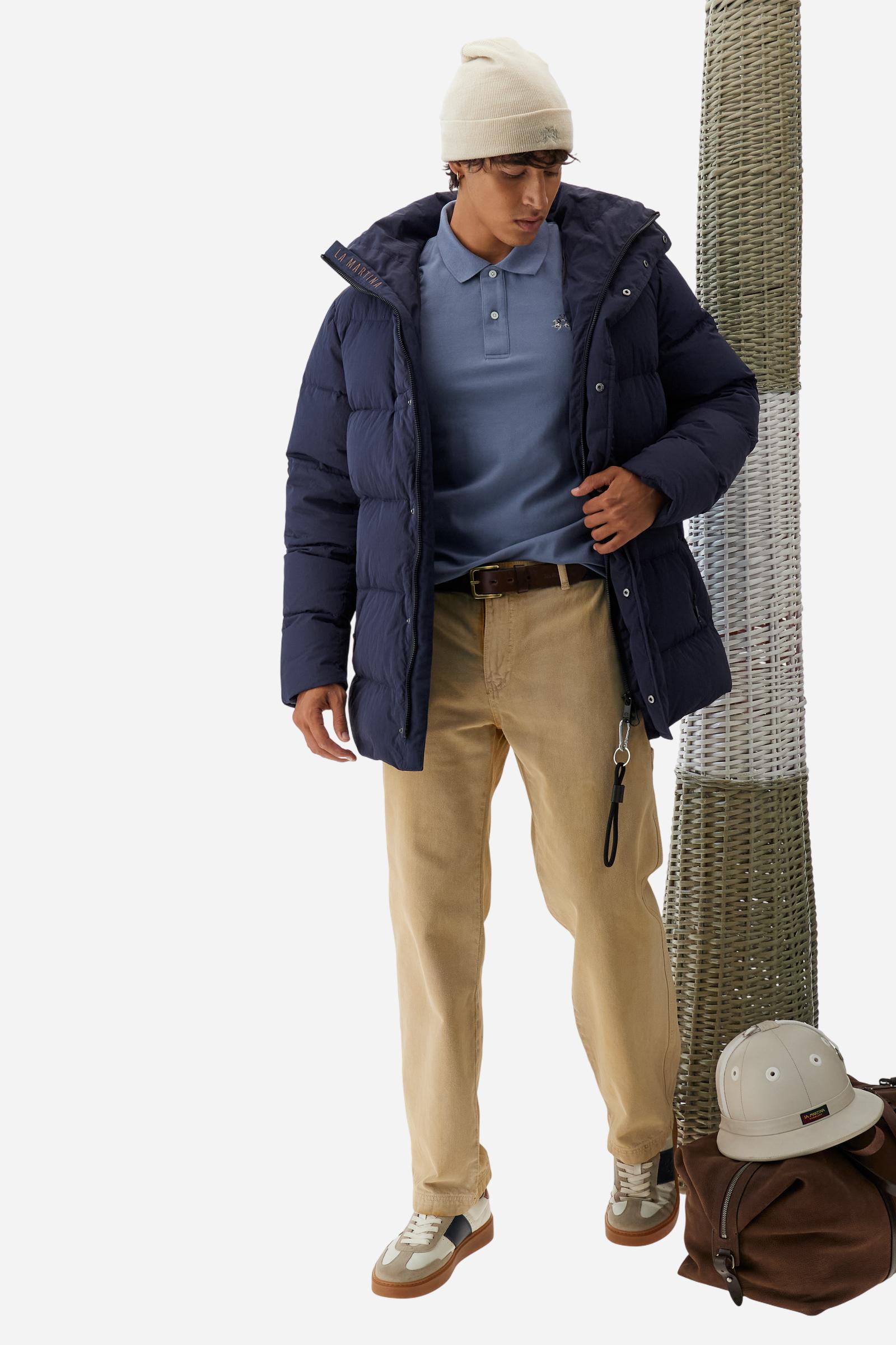 Men’s long-sleeve polo in high-quality stretch cotton piqué for comfort and flexibility. Tone-on-tone ribbed collar with contrast gabardine undercollar embroidered with the brand’s iconic lettering, revealed when the collar is lifted. Contrast embroidered logo on the chest. Slim fit, offering a modern silhouette that enhances the body while ensuring freedom of movement. Model wears size L. - Flint Stone