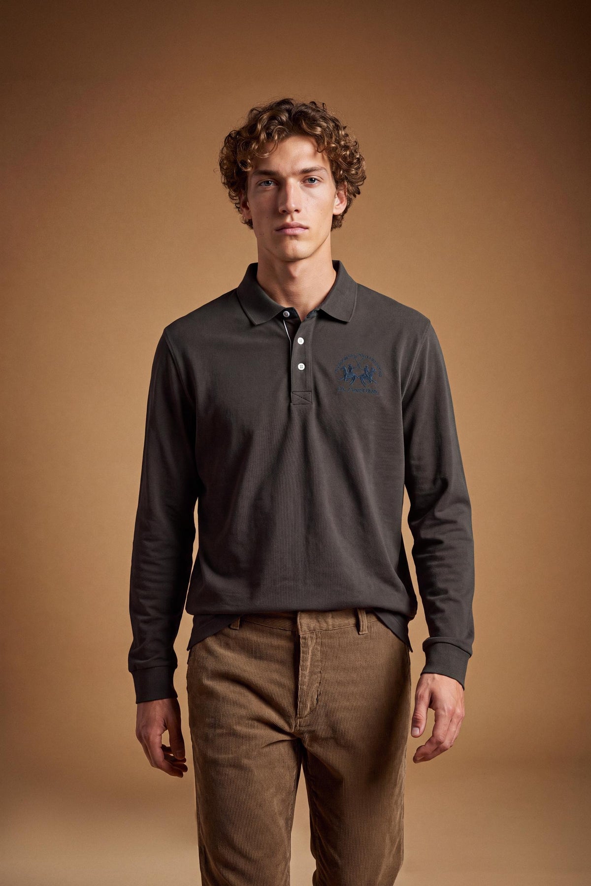 Men's long-sleeve polo in soft cotton jersey with contrasting gabardine collar, ribbed details, multicolor striped placket, and embroidered team logo for comfor - Hot Fudge