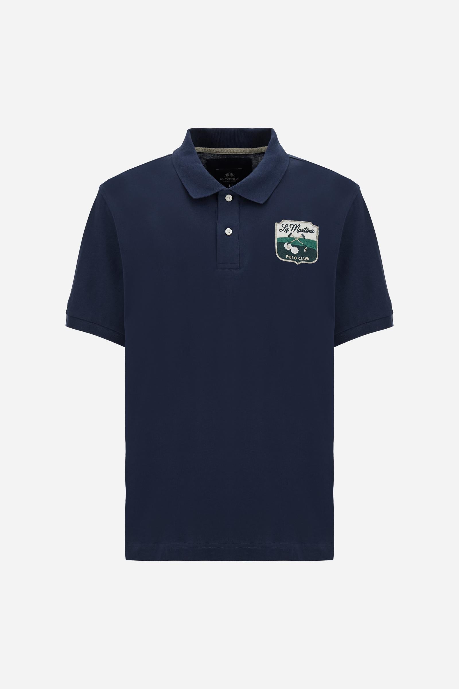 Men’s short-sleeve cotton piqué polo. Two-button placket and contemporary fit, featuring an applied shield patch on the chest and large lettering on the back. - Navy                                                                                                                                                                                                                                                                                                                                                           