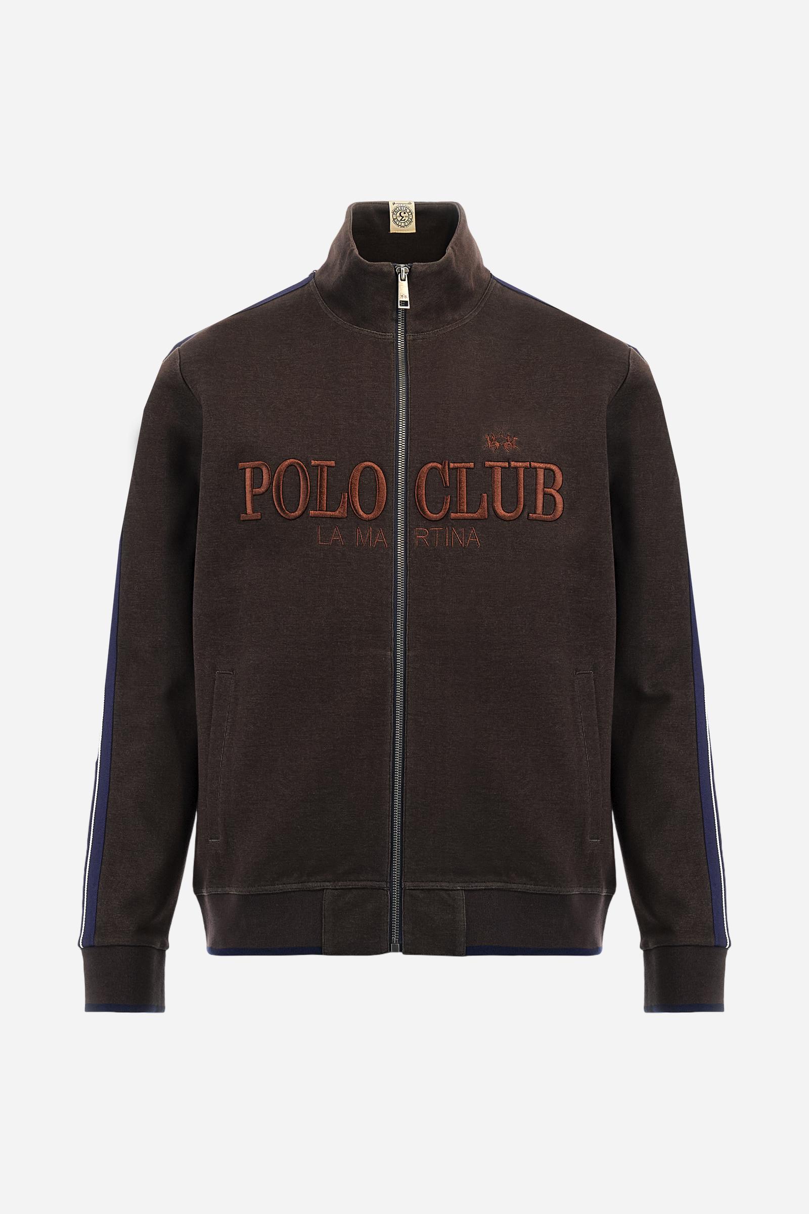 Men's long-sleeved, full-zip sweatshirt. Made of soft solid colour cotton fleece. The neck and cuffs and waistband are in solid colour ribbed knit with contrasting edging. Front zip opening and Polo club guarantee label applied to the edge inside the collar. The front lettering is a large tone-on-tone raised embroidery. A narrow two-tone striped band is applied to the shoulders and sleeves. Regular fit. The model is wearing a size L. - Java
