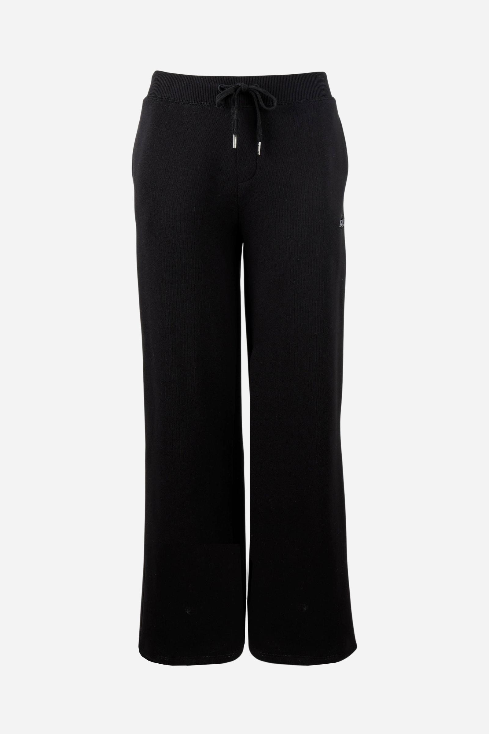 Women's pants in soft brushed cotton with an elastic waistband, adjustable drawstring, vertical side pockets, and a relaxed wide-leg fit for all-day comfort. - Black