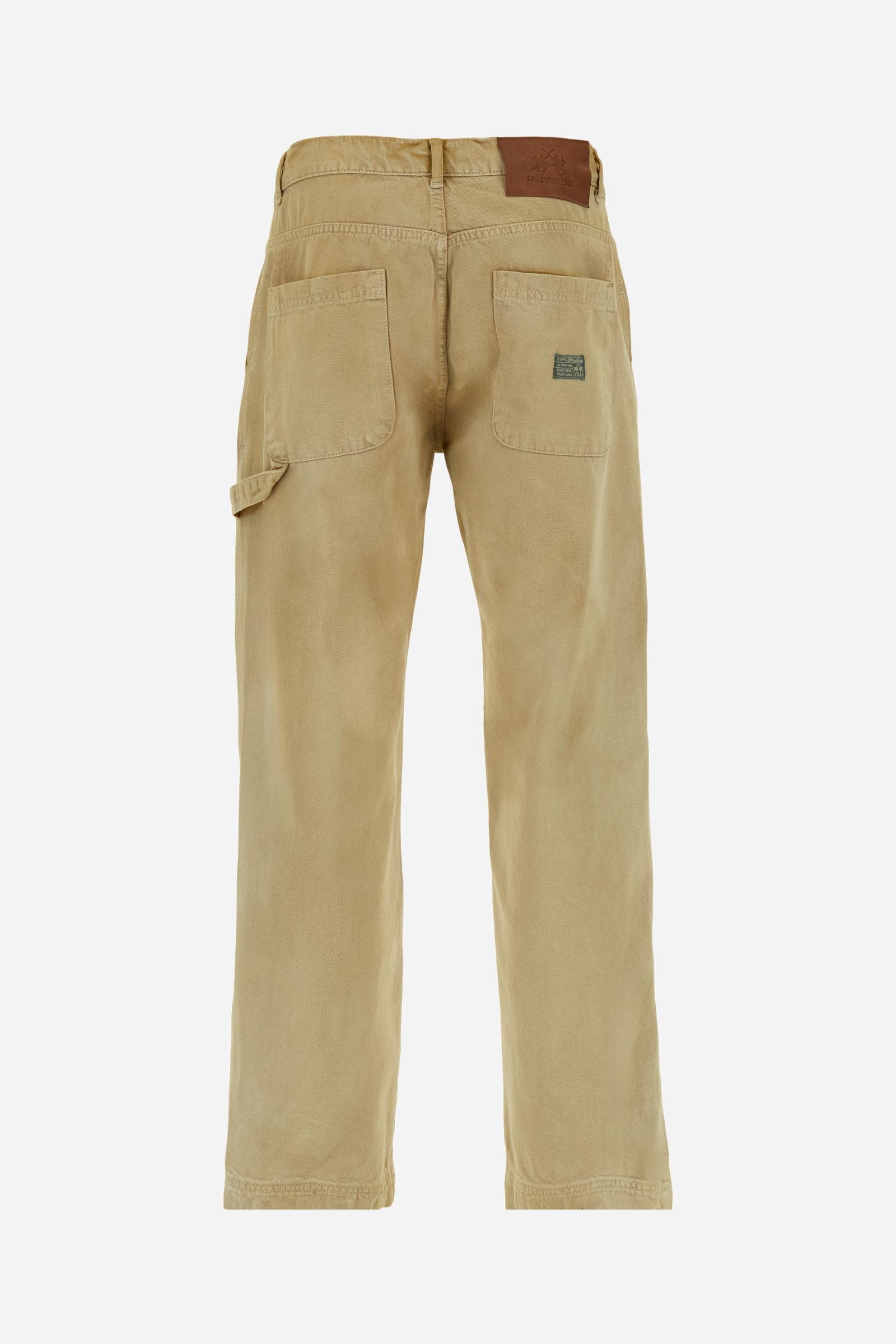 Men's Carpenter trousers in pure bull cotton. The classic five-pocket construction features a relaxed fit through the hips and thighs, with straight, wide legs.The fabric undergoes an authentic faded treatment that gives it a lived-in character and a used effect with contemporary appeal. The brand's guarantee label is applied to the back pocket, while the logo appears on a faux leather patch attached to the back of the wasitband.The model is wearing a size 33. - Bone Brown