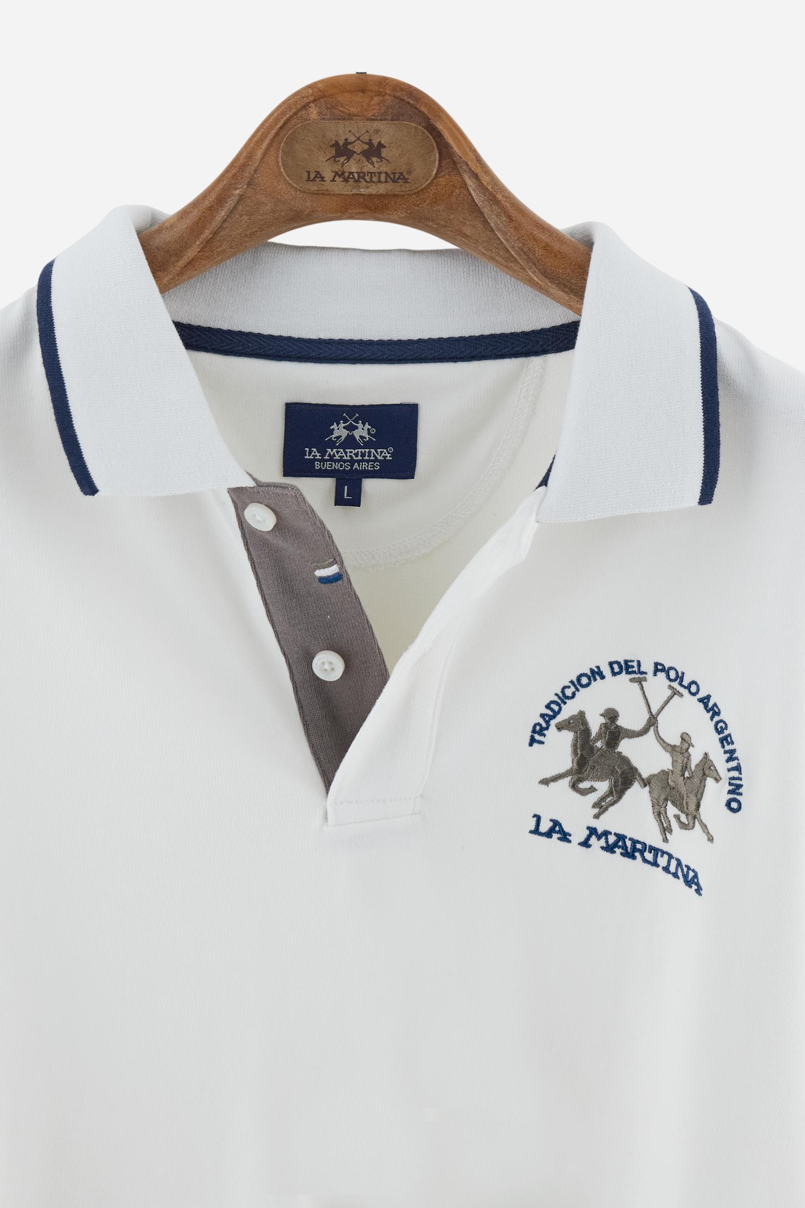 Men’s long-sleeve polo shirt in solid-colour cotton jersey with a warm, matte handfeel. Ribbed collar and cuffs with stripes and colour blocks in contrast, two personalised buttons and contrast details inside the collar. Patches and graphics on sleeves and chest celebrate the Official Polo Supplier team. The large multicolour logo is embroidered on the chest. Regular fit. The model wears size L. - Off White