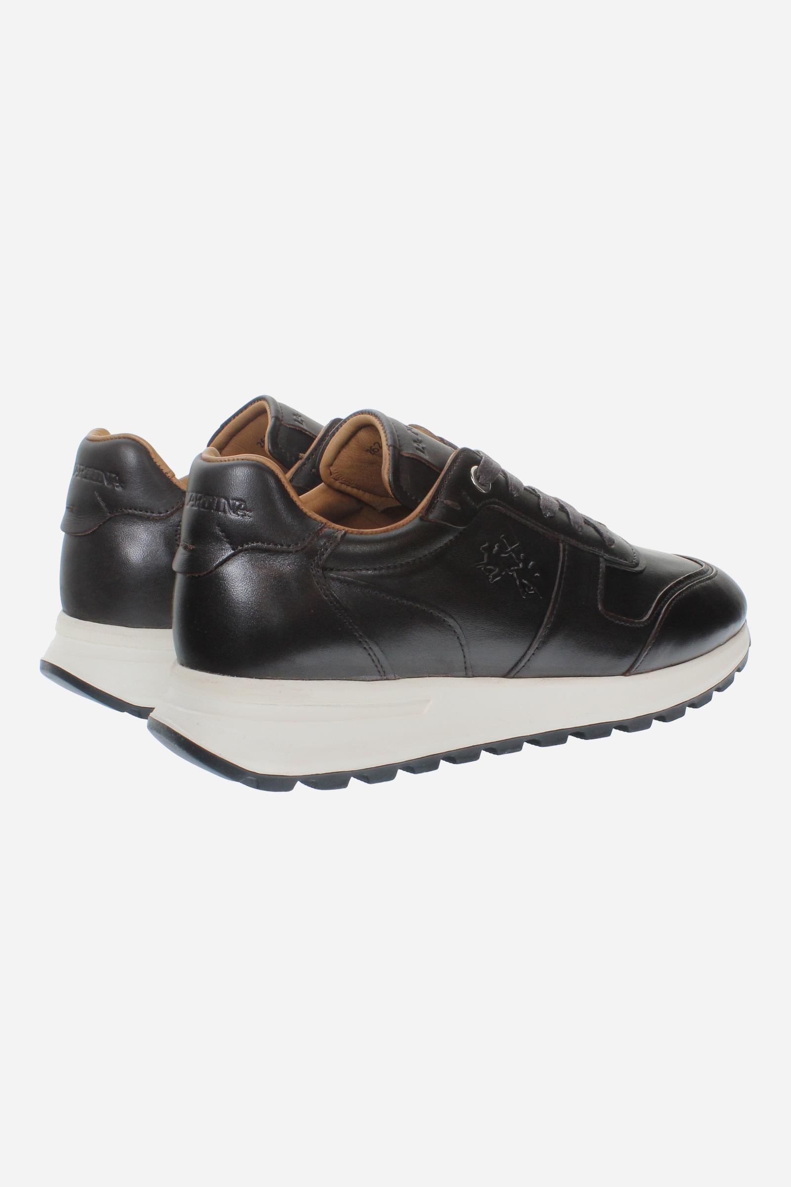 Men's leather sneaker with tone-on-tone stitching, hand-stitched details, embossed logos, and a lightweight two-tone EVA sole for comfort and grip. - Dark Brown