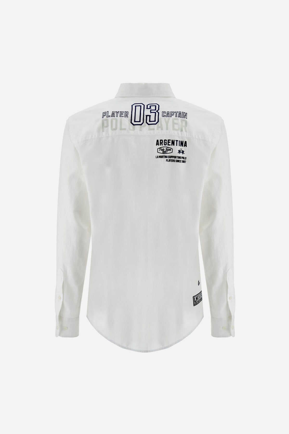 Men’s long-sleeve cotton and linen shirt. Regular fit with strong graphic identity, featuring prints and embroidery inspired by the Polo Team Argentina. - Optic White