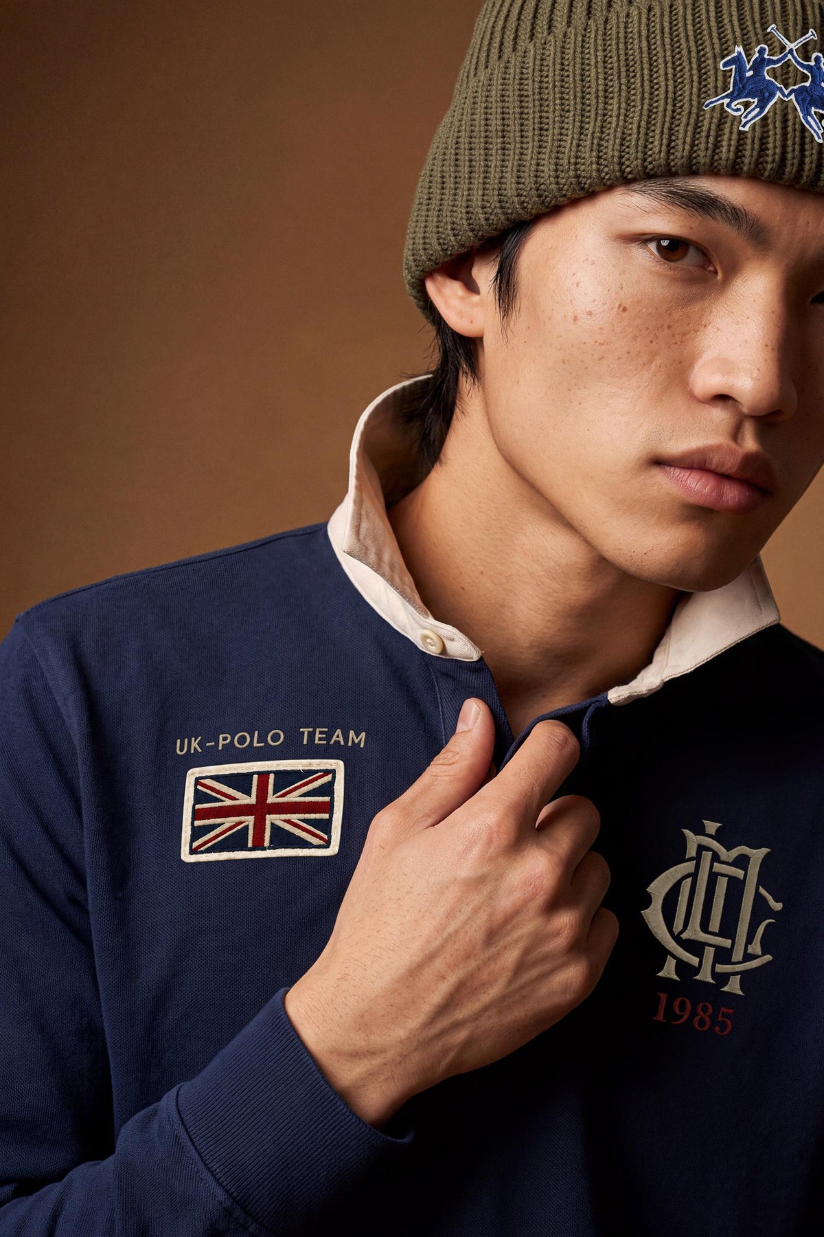 Men’s long-sleeve polo in heavy pure cotton jersey with textured fabric, hidden placket, ribbed cuffs, and heritage British polo graphic for a classic, clean fit. - Navy Blazer