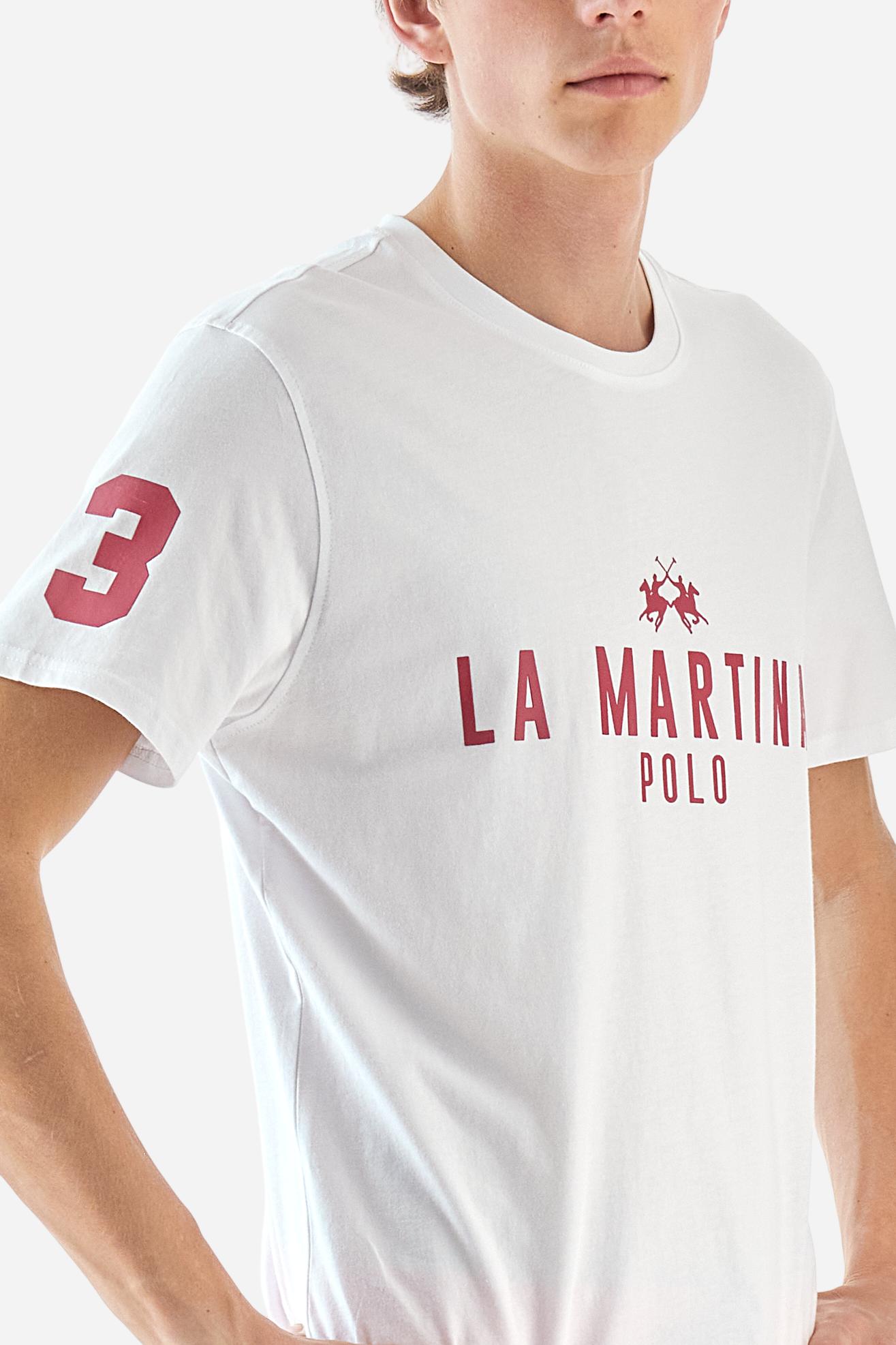 Men's single-colour crew-neck T-shirt with short sleeves, made of 100% cotton. The front features a printed logo and the lettering La Martina Polo. The number 3 is printed on one of the sleeves. Regular fit. The model is wearing a size L. - Opt.White/Honeysuckl