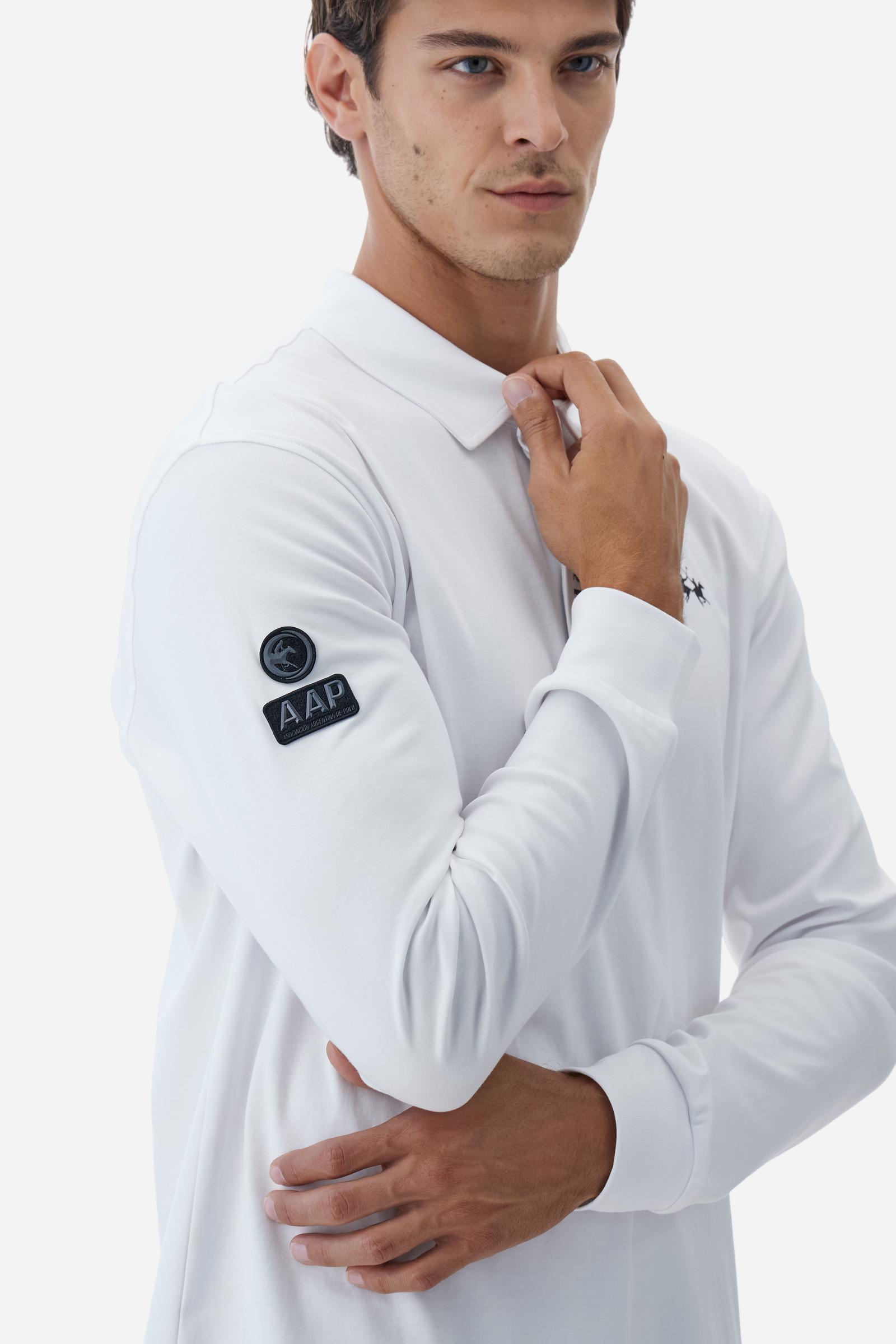 Premium men’s long-sleeve polo shirt in 100% cotton jersey with a smooth, silky texture. Hidden button placket and vertical contrast print. Patches dedicated to the Asociación Argentina de Polo (AAP) on the sleeve and below the opening. Small semi-transparent contrasting logo printed on the chest. Regular fit. The model wears size L. - Optic White