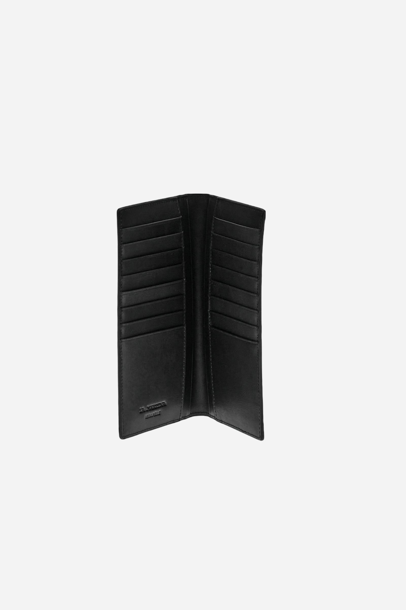 Vertical men’s wallet in calfskin leather. Slim and refined design with small metal logo on the front. - Black