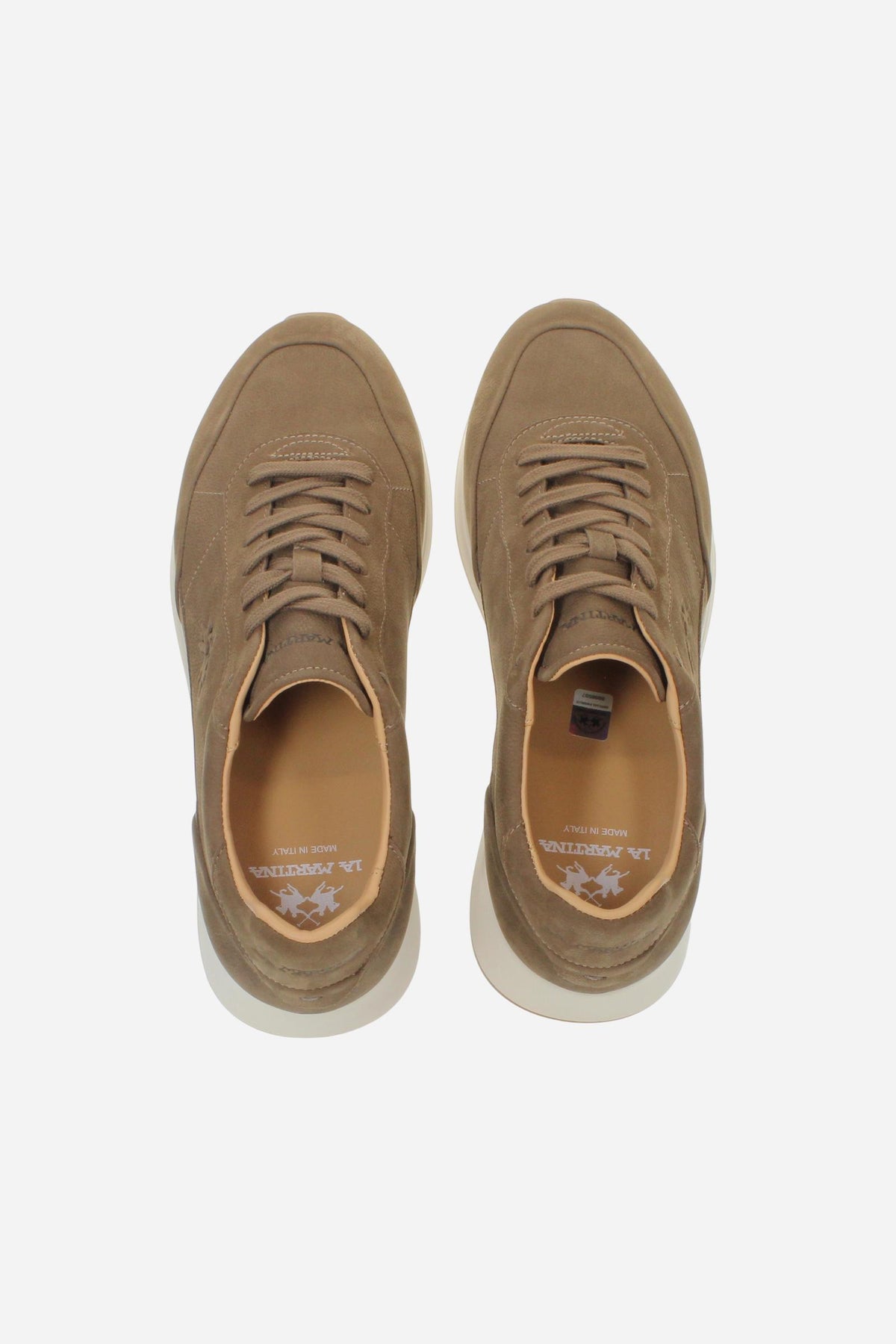 Men's nubuck sneaker with handcrafted stitching, embossed logo, leather-colored lining, and two-tone rubber PU sole for comfort and style. Made in Italy. - Camel