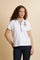 Women’s short-sleeve polo in stretch piqué with deep four-button placket and custom gold buttons. Ribbed collar with contrast stripe detail and matching ribbed cuffs. Regular fit with side slits. Large heraldic “Guards Polo Club” embroidery on the chest and contrast LM monogram on the upper back. The model wears size 2. - Optic White                                                                                                                                                                                 