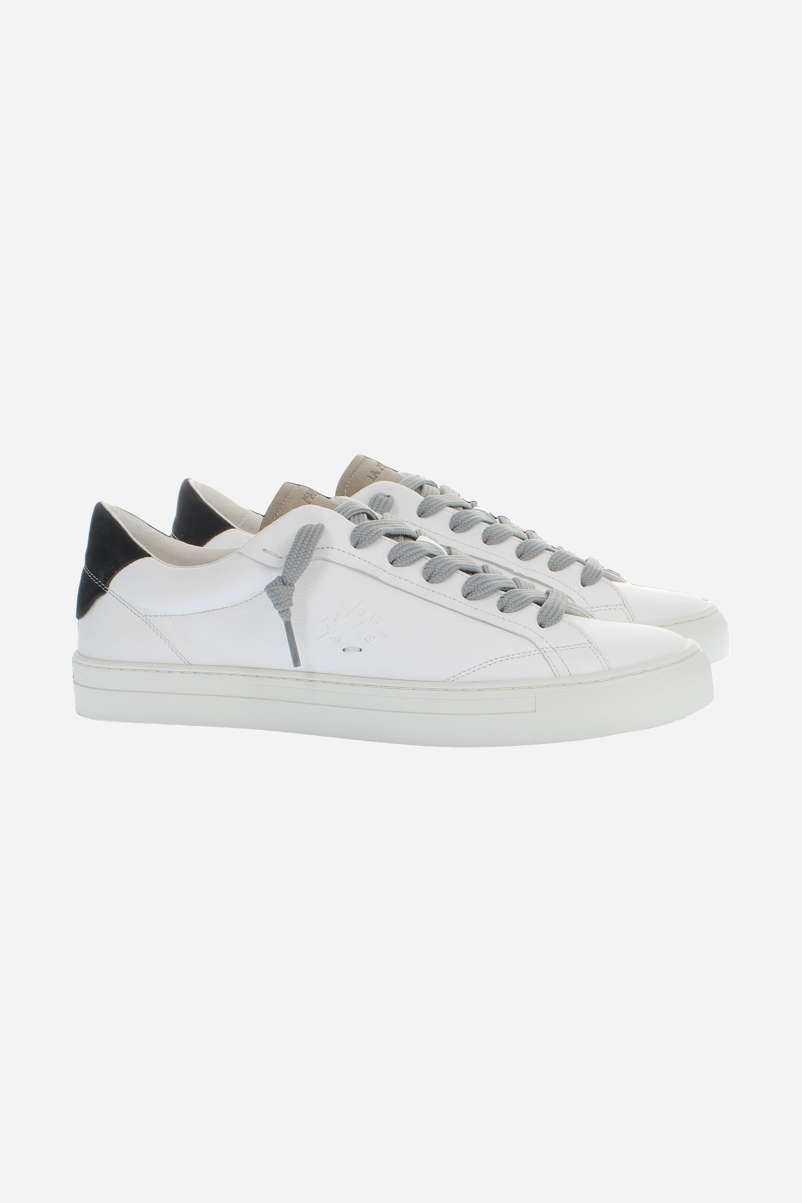 Leather sneaker blending vintage and modern style, with flexible divided tongue, nubuck heel, hand-stitched details, and a lightweight, comfortable off-white sole. - Optic White
