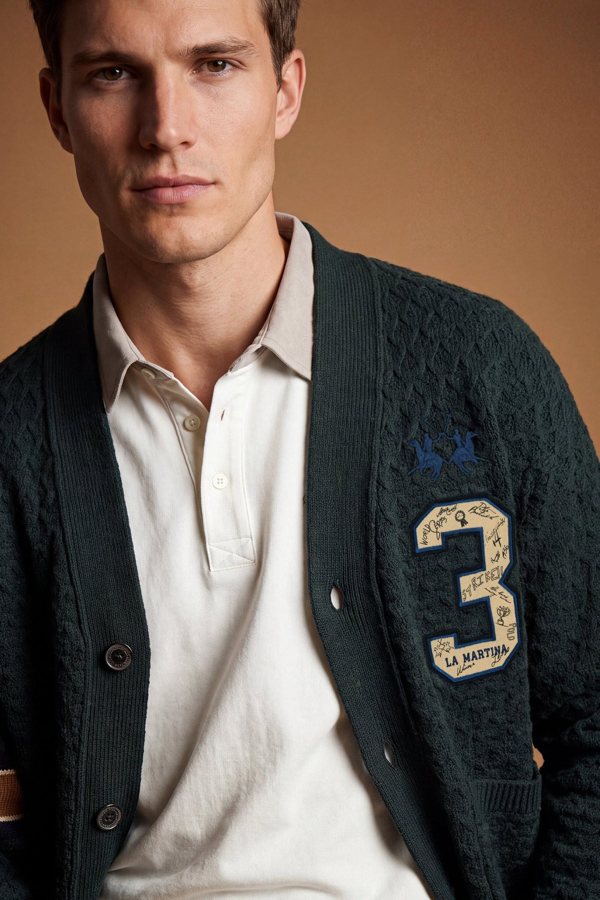 Men's long-sleeve cardigan in 50% lambswool blend with 3D knit, large buttons, patch pockets, bold "3" applique, brand embroidery, and relaxed oversized fit. - Scarab