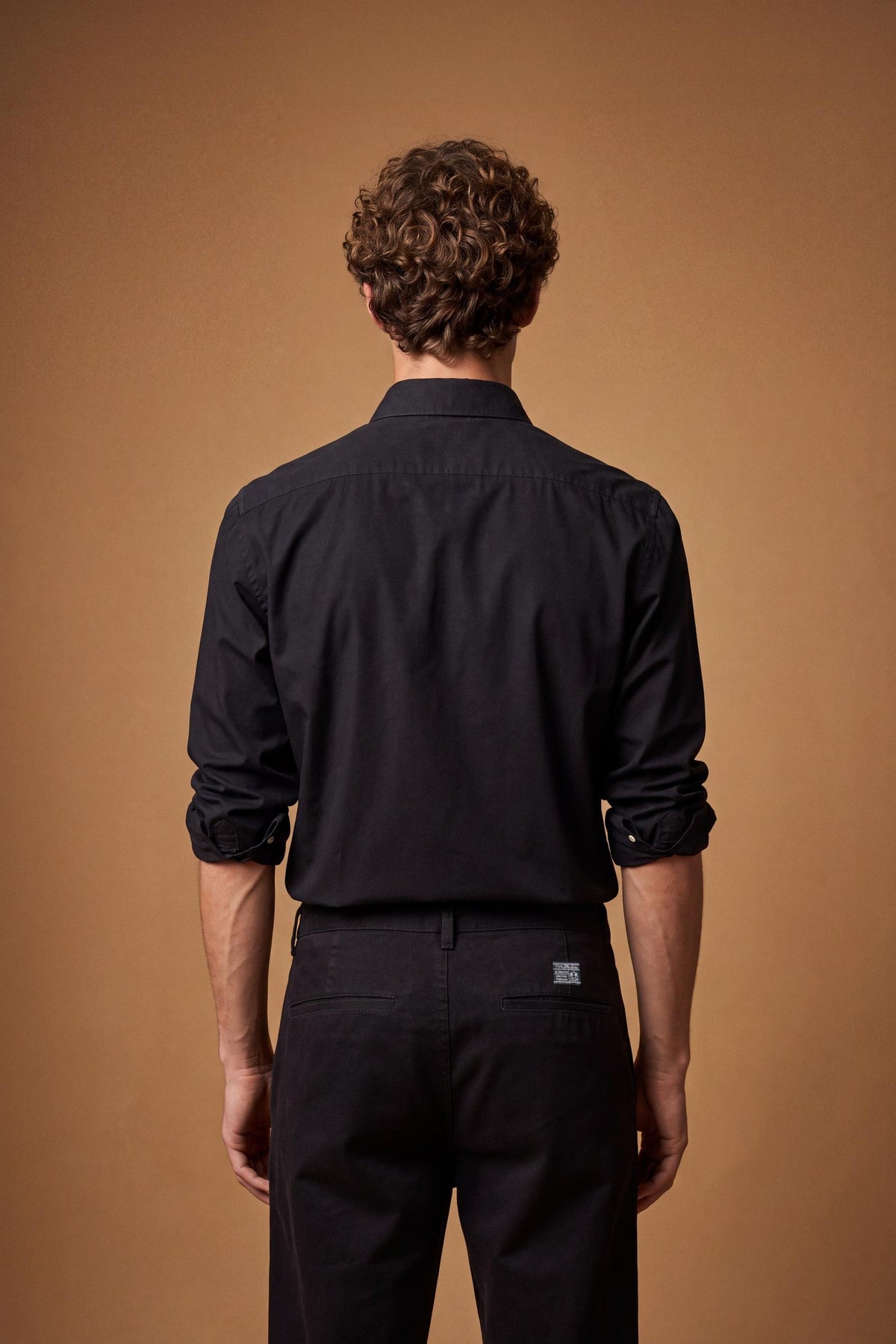 Men's long-sleeve 100% cotton poplin shirt with regular fit, French collar, custom buttons, single-button cuff, and Argentina Edition labels for a refined look. - Black