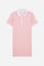 Short-sleeved polo dress for girls made from pure cotton piqué in a solid colour. The style features a comfortable fit, fluid silhouette and above-the-knee length. The two-tone ribbed collar, buttoned front opening and striped trims add a sporty and refined touch. The logo on the sleeve and the lettering under the collar complete the design. - FairTale