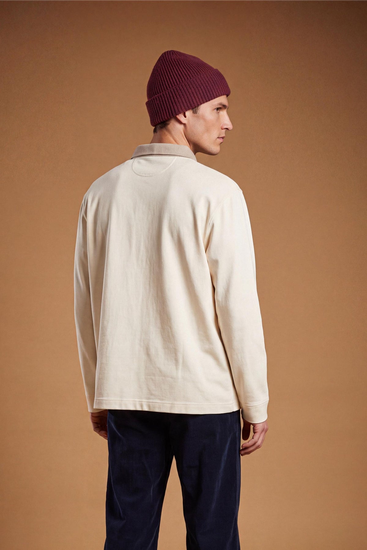 Men's long-sleeve polo in heavyweight 100% cotton jersey with a contrasting collar and hidden placket. Features a relaxed fit and a large 3D embroidered logo. - Pristine