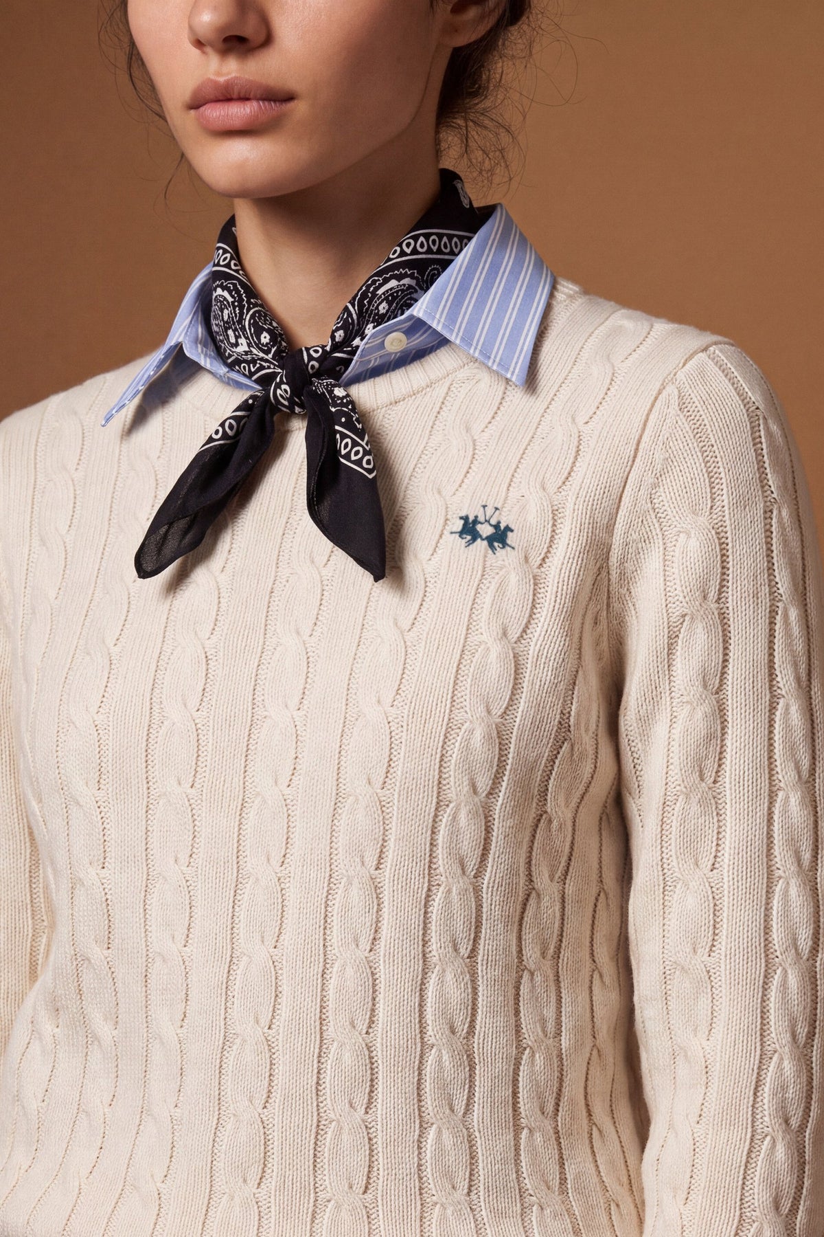 Women's long-sleeve crew neck sweater in wool-cashmere blend with classic cable knit, ribbed details, and a subtle embroidered logo for a refined, comfortable fit. - Antique White