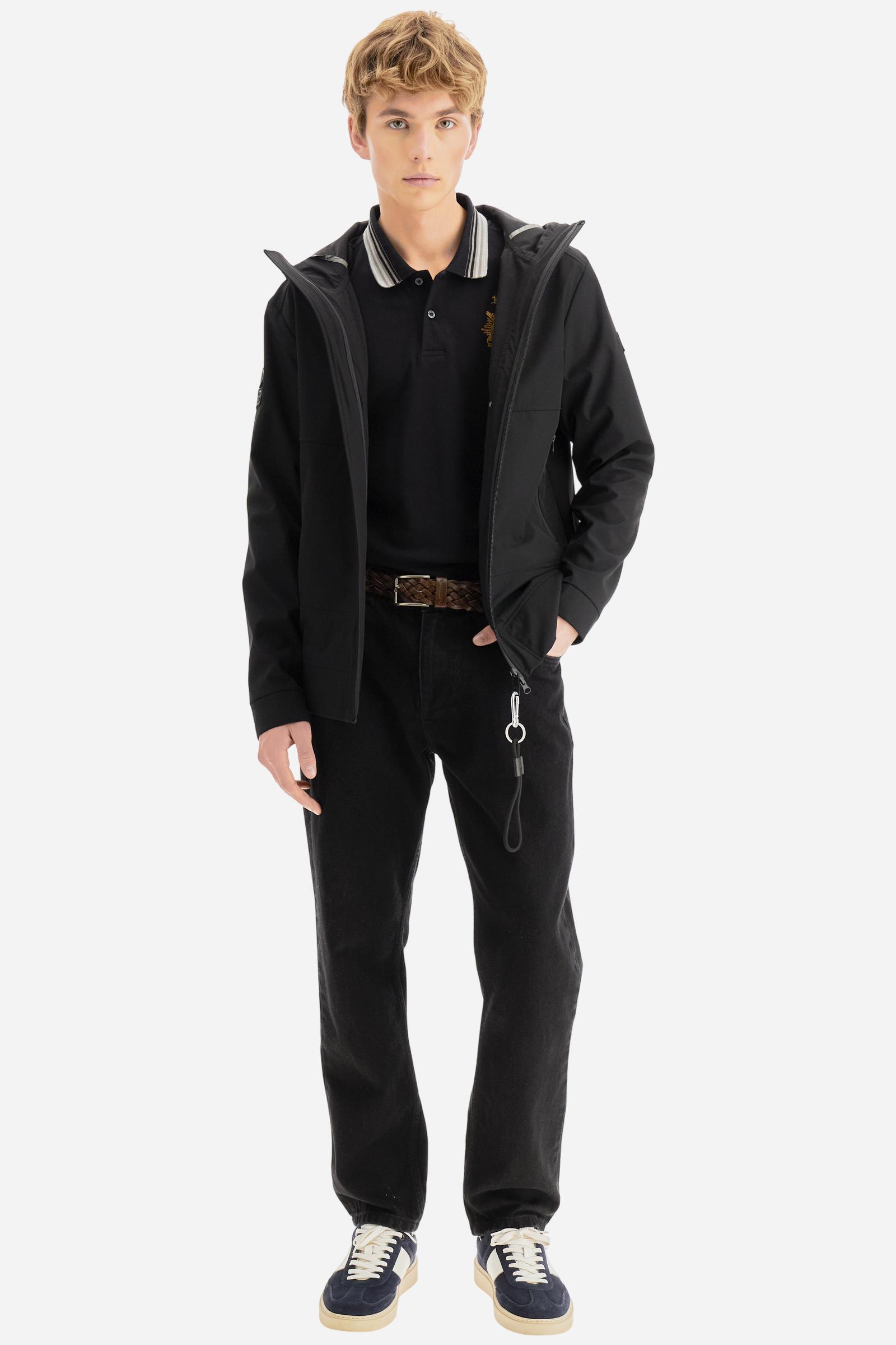 Long-sleeve polo shirt in warm cotton jersey. Ribbed collar with multicolor stripes, contrast inner collar, and two-button placket. Brand logo and Guards crest embroidered in contrast on the chest. Regular fit for a comfortable, versatile silhouette. Model wears size L. - Black