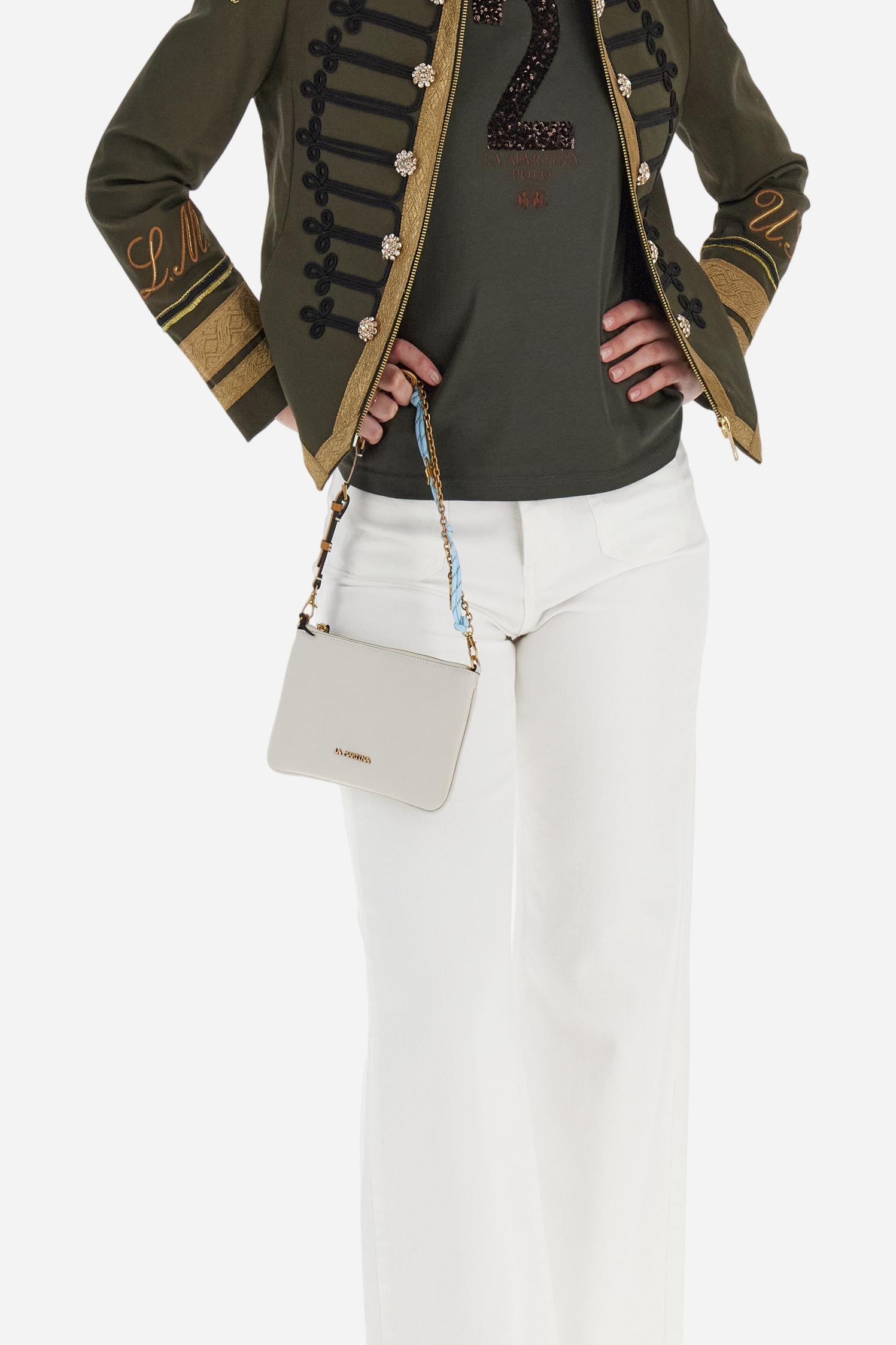 Women’s long-sleeve crew-neck T-shirt in 100% cotton jersey. The smooth, fluid fabric feels silky on the skin. On the chest, a large sequin patch number is paired with brand-identifying embroidered lettering, while a small logo is embroidered underneath. Regular fit for a versatile piece that combines simplicity with subtle glamour. Model wears size 2. - Falcon