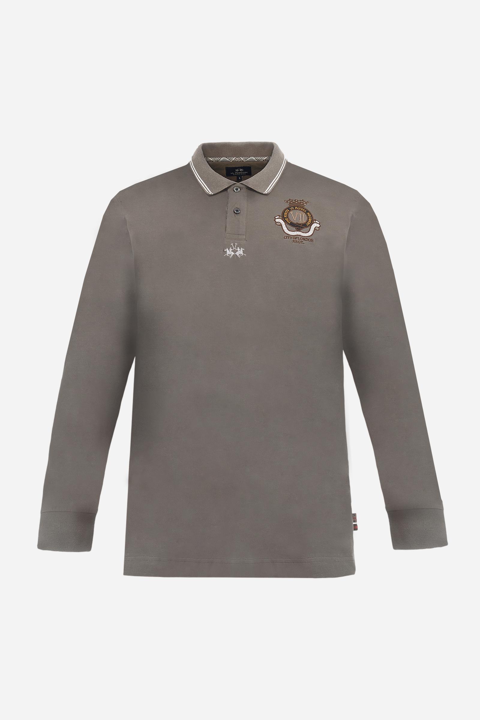 Long-sleeve polo shirt in stretch cotton jersey, soft and breathable. Ribbed collar with contrast striped edge and inner tartan ribbon. A colorful embroidered crest enriches the chest, complemented by a tonal embroidered logo under the placket with two personalized buttons. Regular fit for a versatile, timeless look. Model wears size L. - Falcon