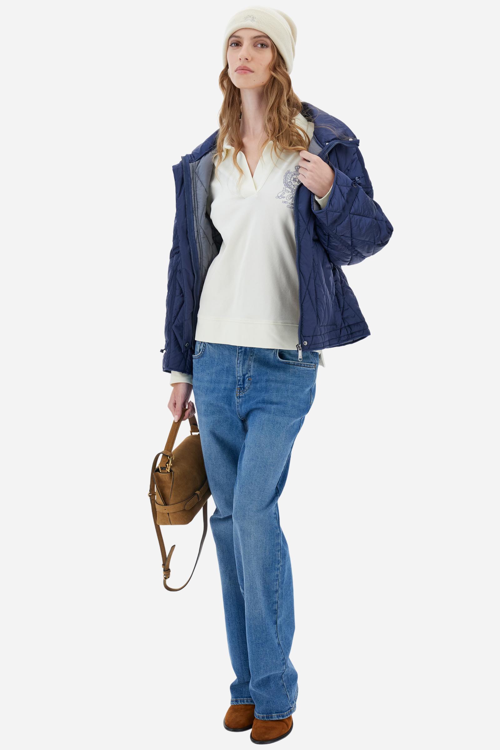 Women’s long-sleeved polo shirt in solid-colored stretch piqué, breathable and cotton-rich. Classic collar with buttonless placket for a clean, essential look. Distinctive Polo Club Limited graphics with embroidered crest on the chest and small embroidered lettering on the collar. The brand logo is placed at the center of the crest. Boxy fit with hip length for a contemporary silhouette. Model wears size 2. - Pristine