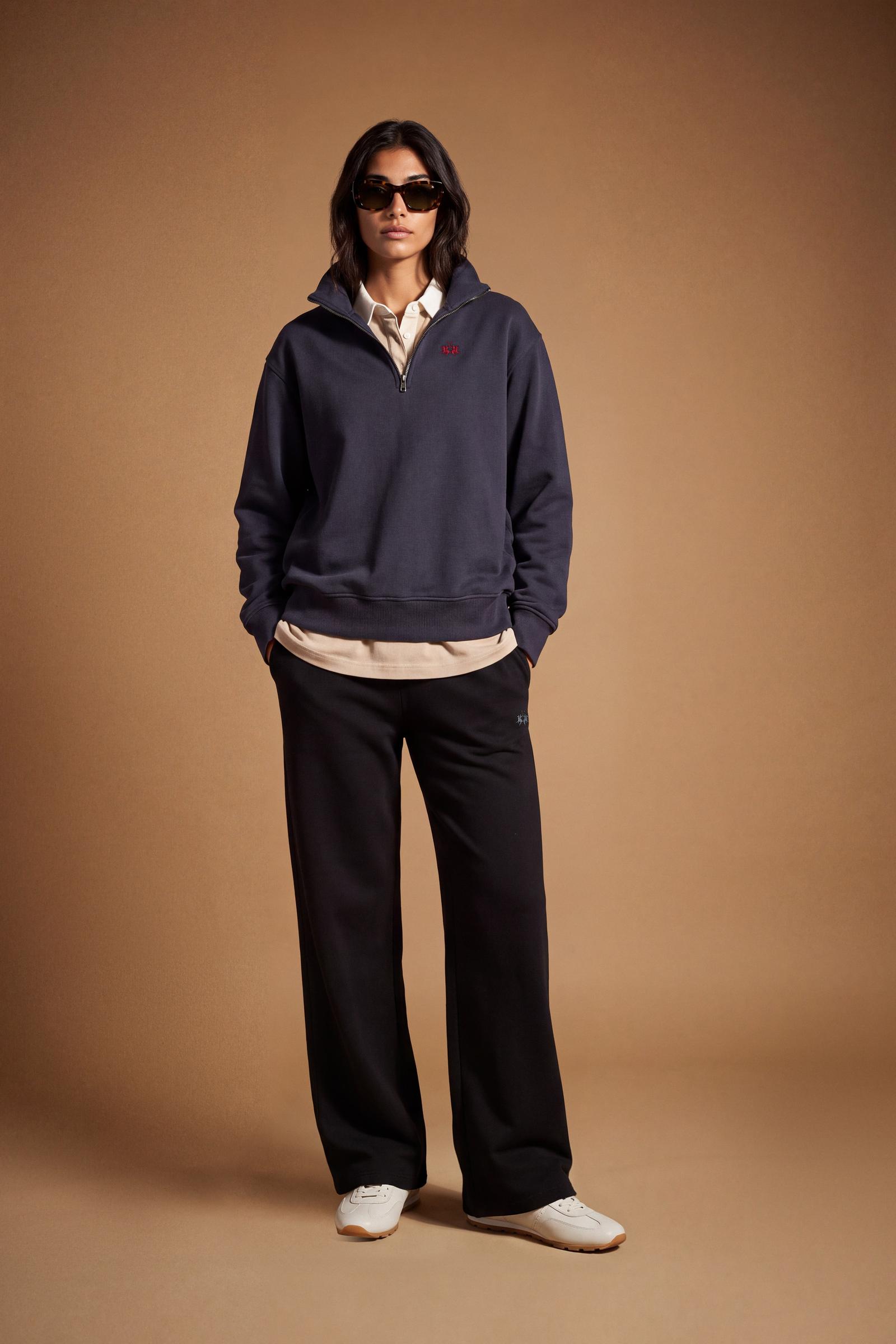 Women's pants in soft brushed cotton with an elastic waistband, adjustable drawstring, vertical side pockets, and a relaxed wide-leg fit for all-day comfort. - Black