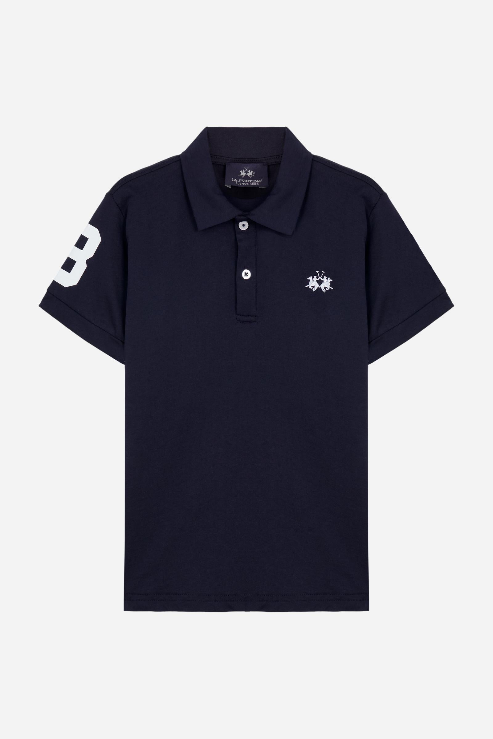 Short-sleeved polo shirt for boys made from soft 100% cotton jersey. The style features a regular fit, two-button front opening and collar in the same fabric. The number “3” printed on the right sleeve, the brand lettering under the collar and the small embroidered logo on the chest add contrast details with an iconic and sporty character. - Navy